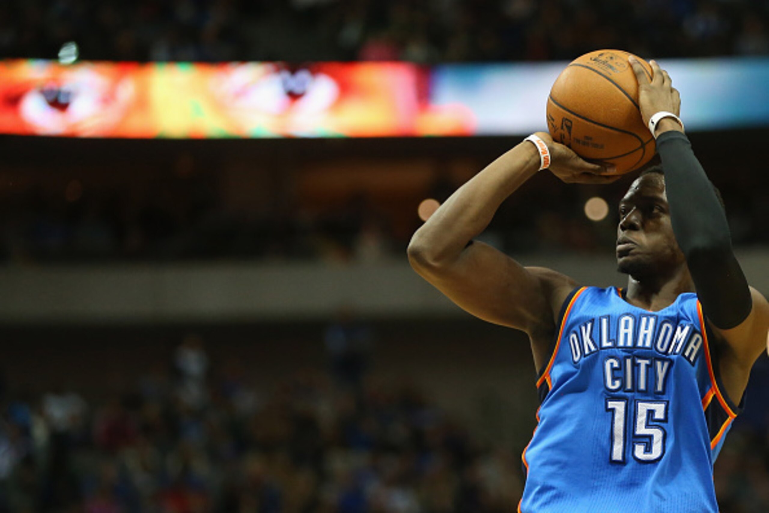 DALLAS, TX - DECEMBER 28: Reggie Jackson #15 of the Oklahoma City Thunder takes a shot against the Dallas Mavericks at American Airlines Center on December 28, 2014 in Dallas, Texas. NOTE TO USER: User expressly acknowledges and agrees that, by download DALLAS, TX - DECEMBER 28: Reggie Jackson #15 of the Oklahoma City Thunder takes a shot against the Dallas Mavericks at American Airlines Center on December 28, 2014 in Dallas, Texas. NOTE TO USER: User expressly acknowledges and agrees that, by download