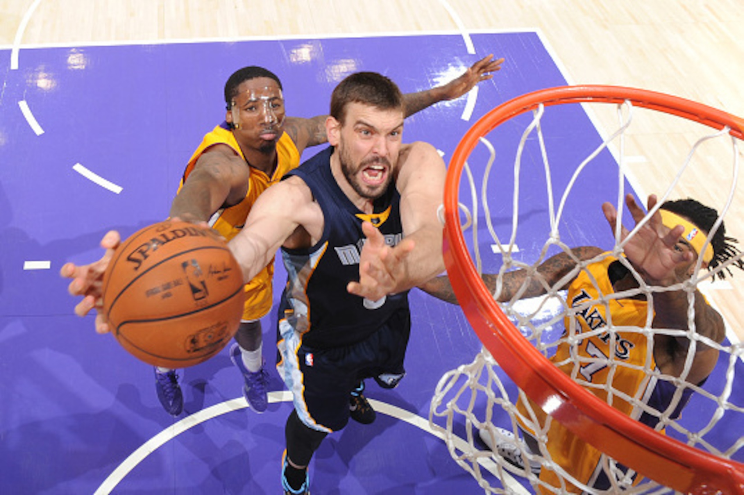LOS ANGELES, CA - JANUARY 2:  Marc Gasol #33 of the Memphis Grizzlies goes to the basket against the Los Angeles Lakers on January 2, 2015 at Staples Center in Los Angeles, California. NOTE TO USER: User expressly acknowledges and agrees that, by download