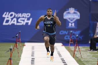 INDIANAPOLIS, IN - FEBRUARY 24: Former Missouri defensive lineman Michael Sam runs the 40-yard dash during the 2014 NFL Combine at Lucas Oil Stadium on February 24, 2014 in Indianapolis, Indiana. (Photo by Joe Robbins/Getty Images)