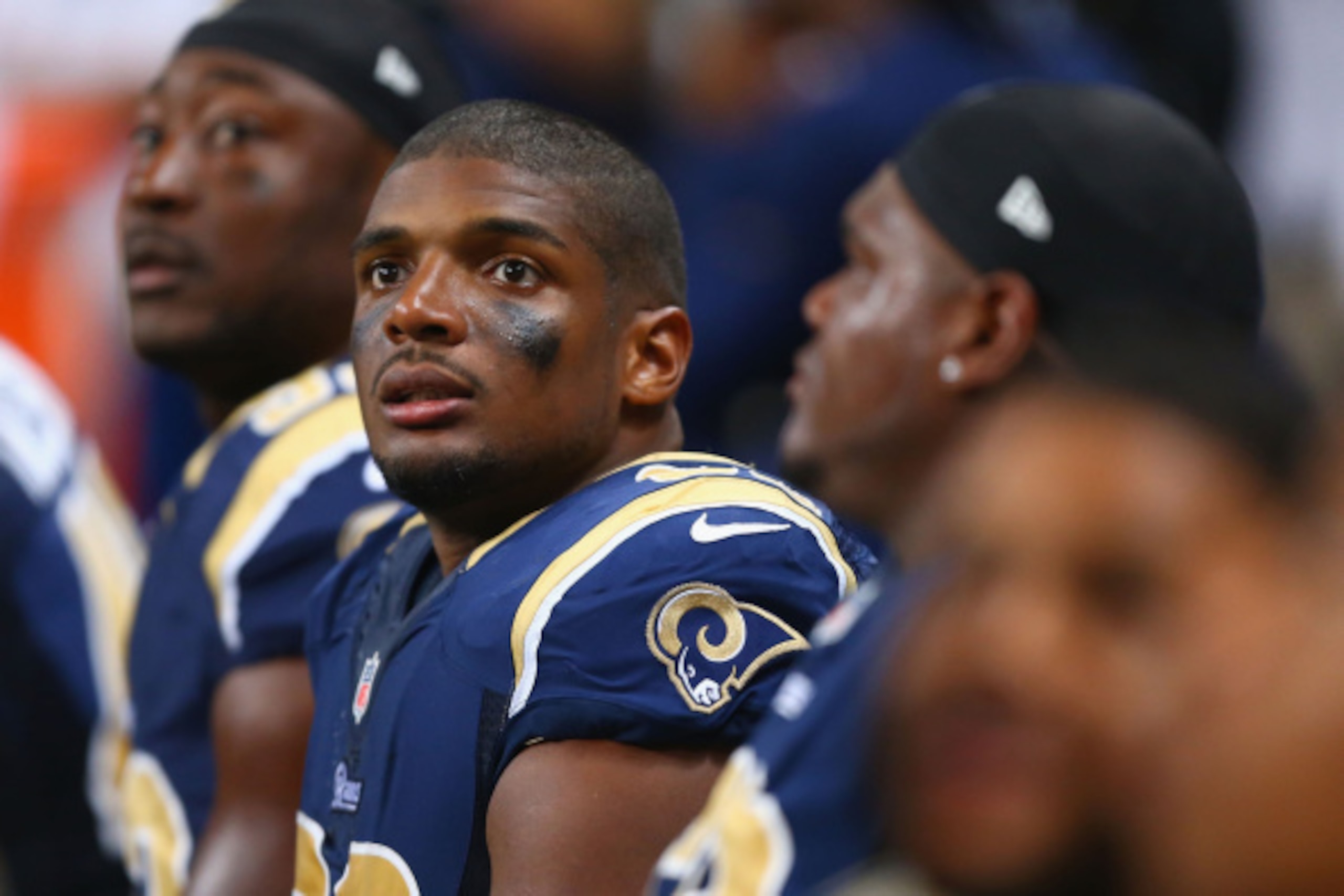 ST. LOUIS, MO - AUGUST 8: Michael Sam #96 of the St. Louis Rams watches from the bench during the second half of a pre-season against the New Orleans Saints game at the Edward Jones Dome on August 8, 2013 in St. Louis, Missouri.  The Saints beat the Rams 