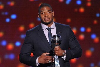 LOS ANGELES, CA - JULY 16:  NFL player Michael Sam accepts the Arthur Ashe Courage Award onstage during the 2014 ESPYS at Nokia Theatre L.A. Live on July 16, 2014 in Los Angeles, California.  (Photo by Kevin Winter/Getty Images)