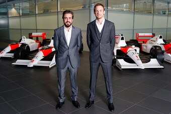 WOKING, ENGLAND- DECEMBER 10: In this handout photo provided by McLaren-Honda, Formula One drivers Fernando Alonso (L) and Jenson Button pose together as McLaren-Honda announces its new driver line-up for 2015 on December 10, 2014 in Woking, England. (Pho