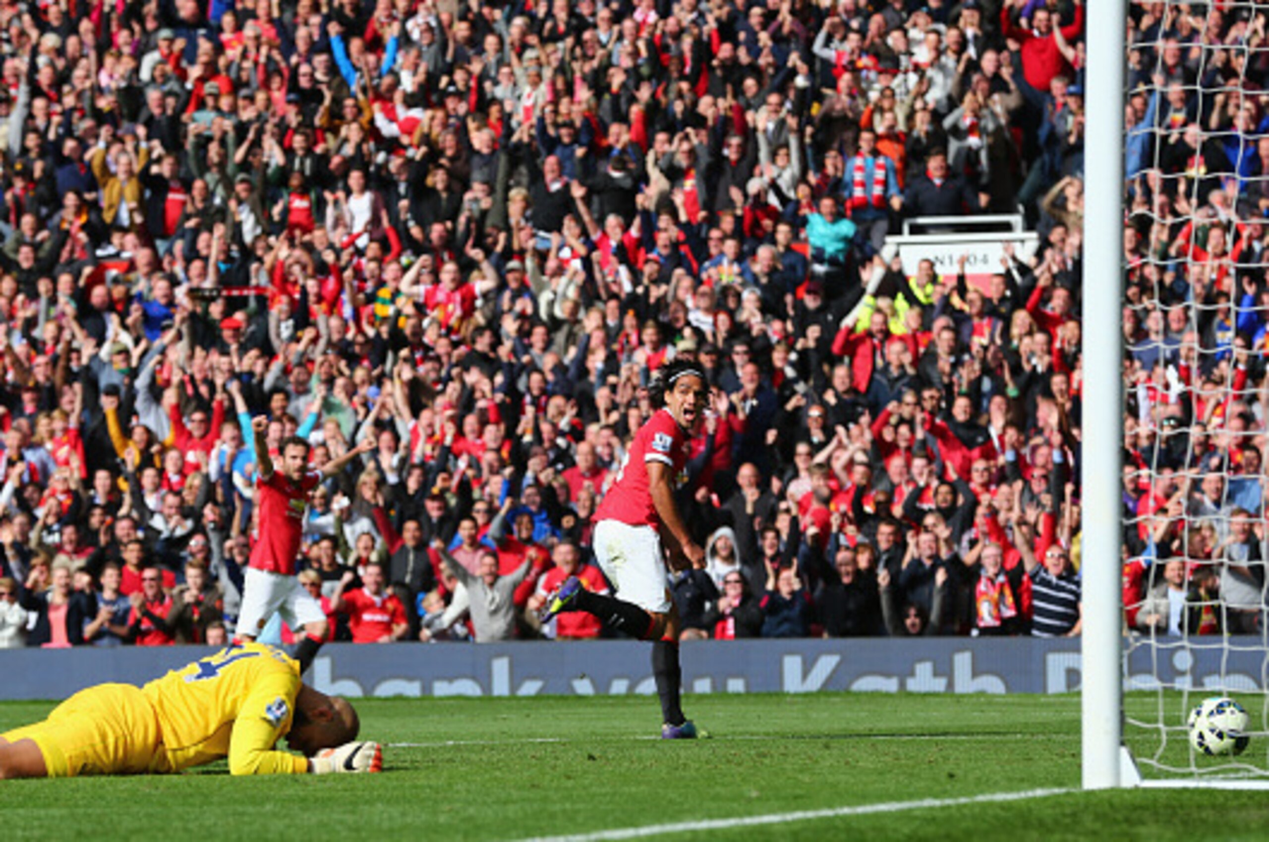 MANCHESTER, ENGLAND - OCTOBER 05:  Radamel Falcao of Manchester United celebrates scoring his team's second goal during the Barclays Premier League match between Manchester United and Everton at Old Trafford on October 5, 2014 in Manchester, England.  (Ph