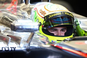 SINGAPORE - SEPTEMBER 21: Sergio Perez of Mexico and McLaren prepares to drive during final practice ahead of qualifying for the Singapore Formula One Grand Prix at Marina Bay Street Circuit on September 21, 2013 in Singapore, Singapore.