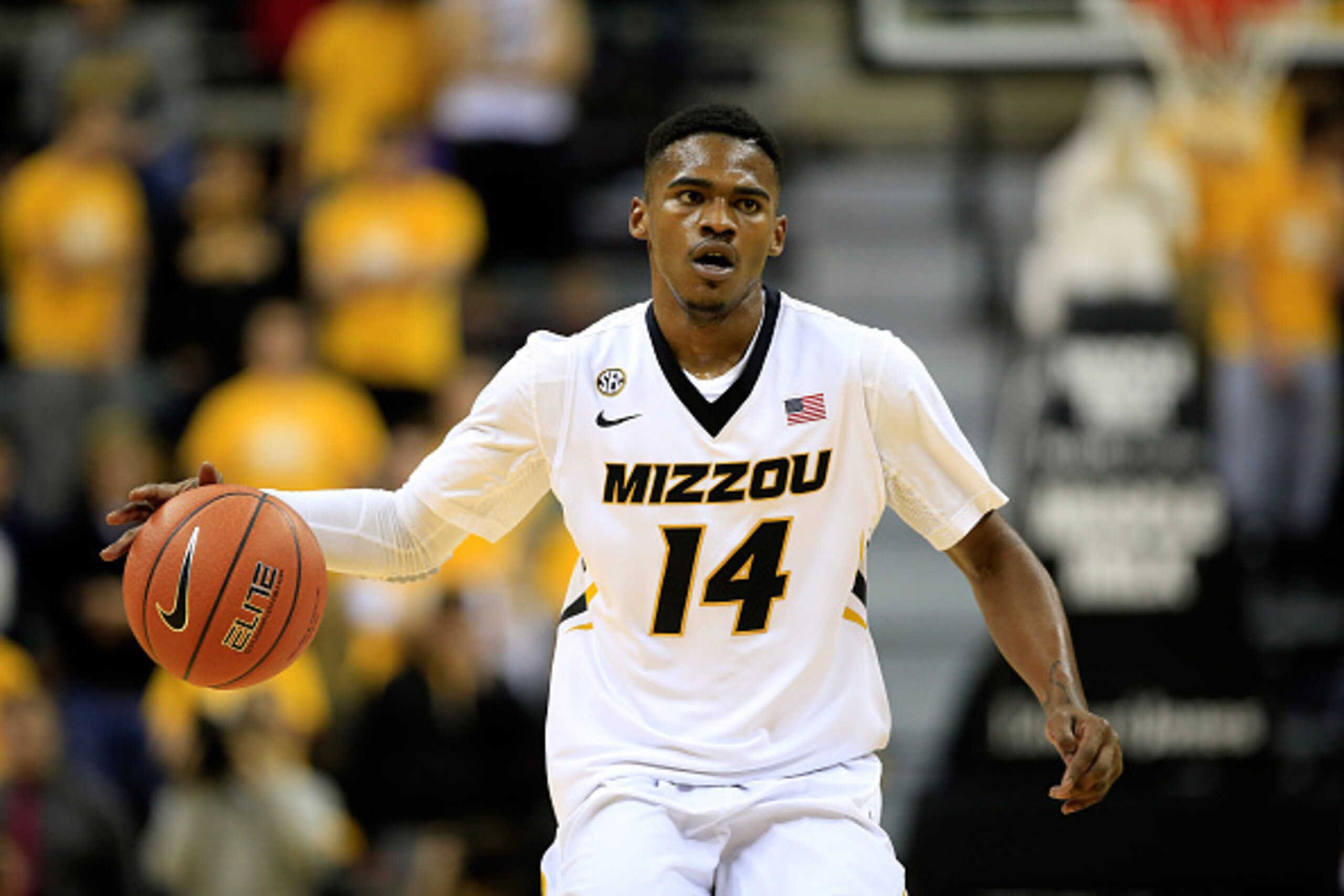 COLUMBIA, MO - DECEMBER 02:  Keith Shamburger #14 of the Missouri Tigers controls the ball during the game against the Southeast Missouri State Redhawks at Mizzou Arena on December 2, 2014 in Columbia, Missouri.  (Photo by Jamie Squire/Getty Images)