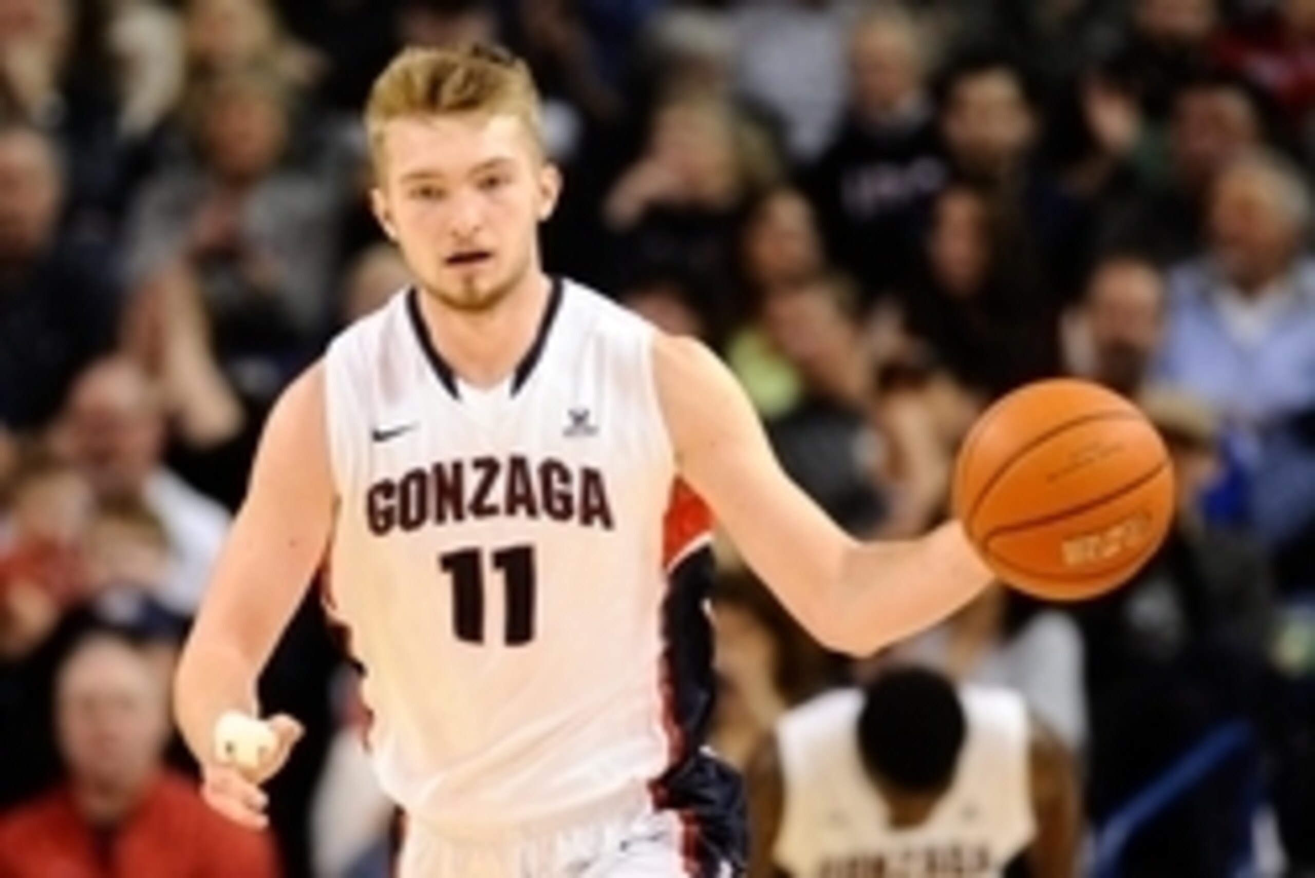 Jan 22, 2015; Spokane, WA, USA; Gonzaga Bulldogs forward Domantas Sabonis (11) brings the ball down court against the Saint Mary   s Gaels during the second half at McCarthey Athletic Center. The Bulldogs won 68-47. Mandatory Credit: James Snook-USA TODAY
