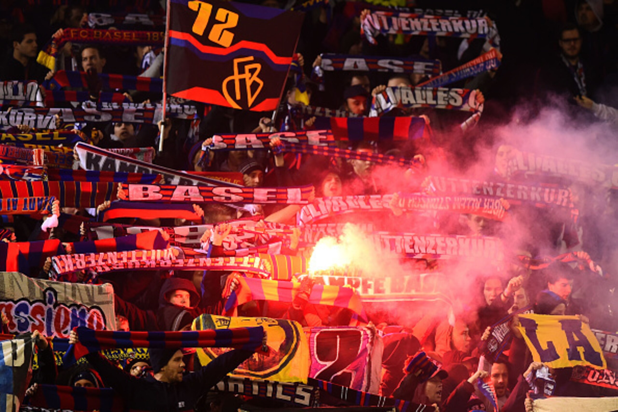LIVERPOOL, ENGLAND - DECEMBER 09:  Basel fans cheer on their team during the UEFA Champions League group B match between Liverpool and FC Basel 1893 at Anfield on December 9, 2014 in Liverpool, United Kingdom.  (Photo by Laurence Griffiths/Getty Images)