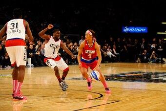 NEW YORK, NY - FEBRUARY 13: Skylar Diggins of the Tulsa Shock dribbles agains Kevin Hart during the Sprint NBA All-Star Celebrity Game as part of 2015 All-Star Weekend at Madison Square Garden on February 13, 2015 in New York, New York. NOTE TO USER: User