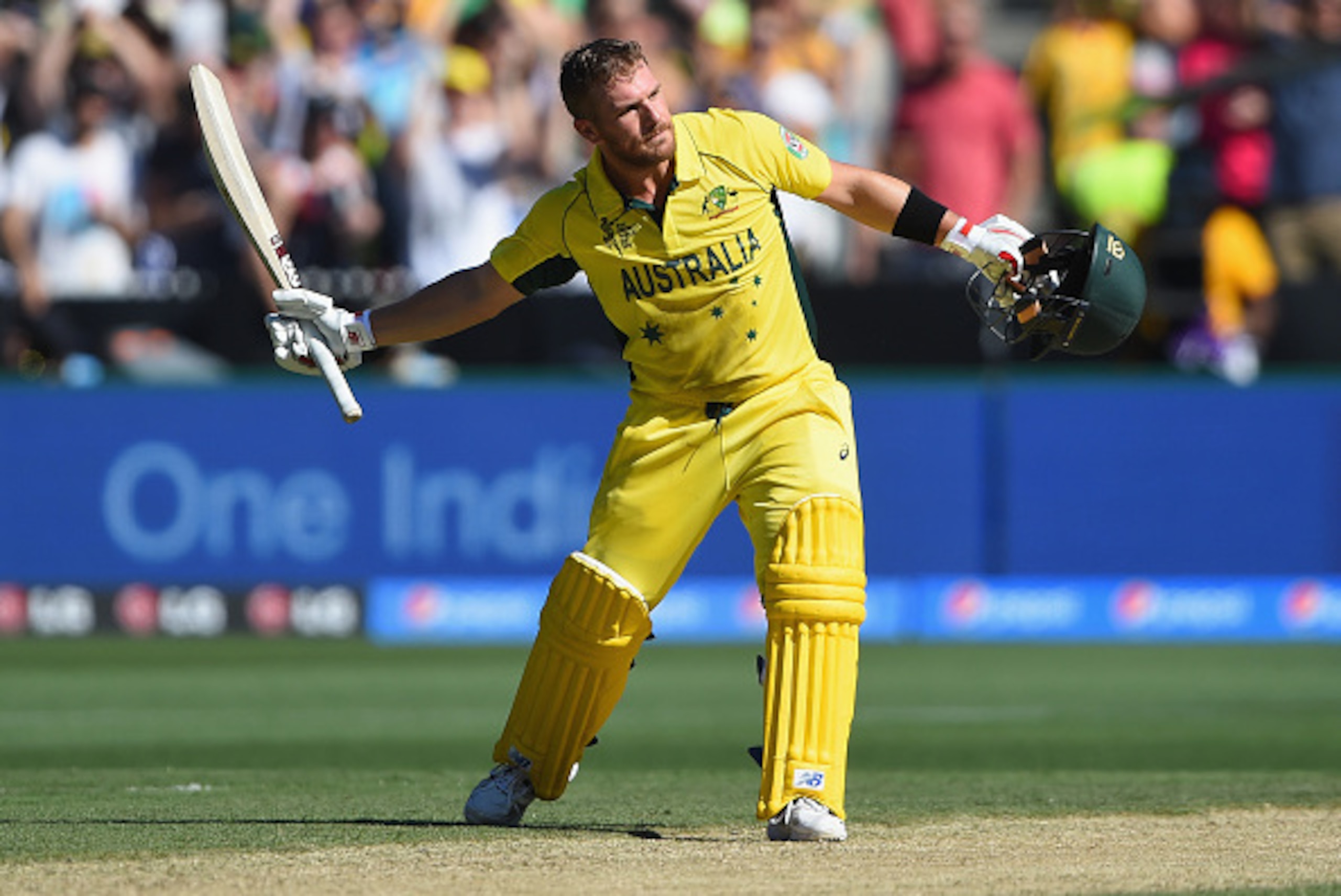 MELBOURNE, AUSTRALIA - FEBRUARY 14:  Aaron Finch of Australia celebrates after reaching his century during the 2015 ICC Cricket World Cup match between England and Australia at Melbourne Cricket Ground on February 14, 2015 in Melbourne, Australia.  (Photo
