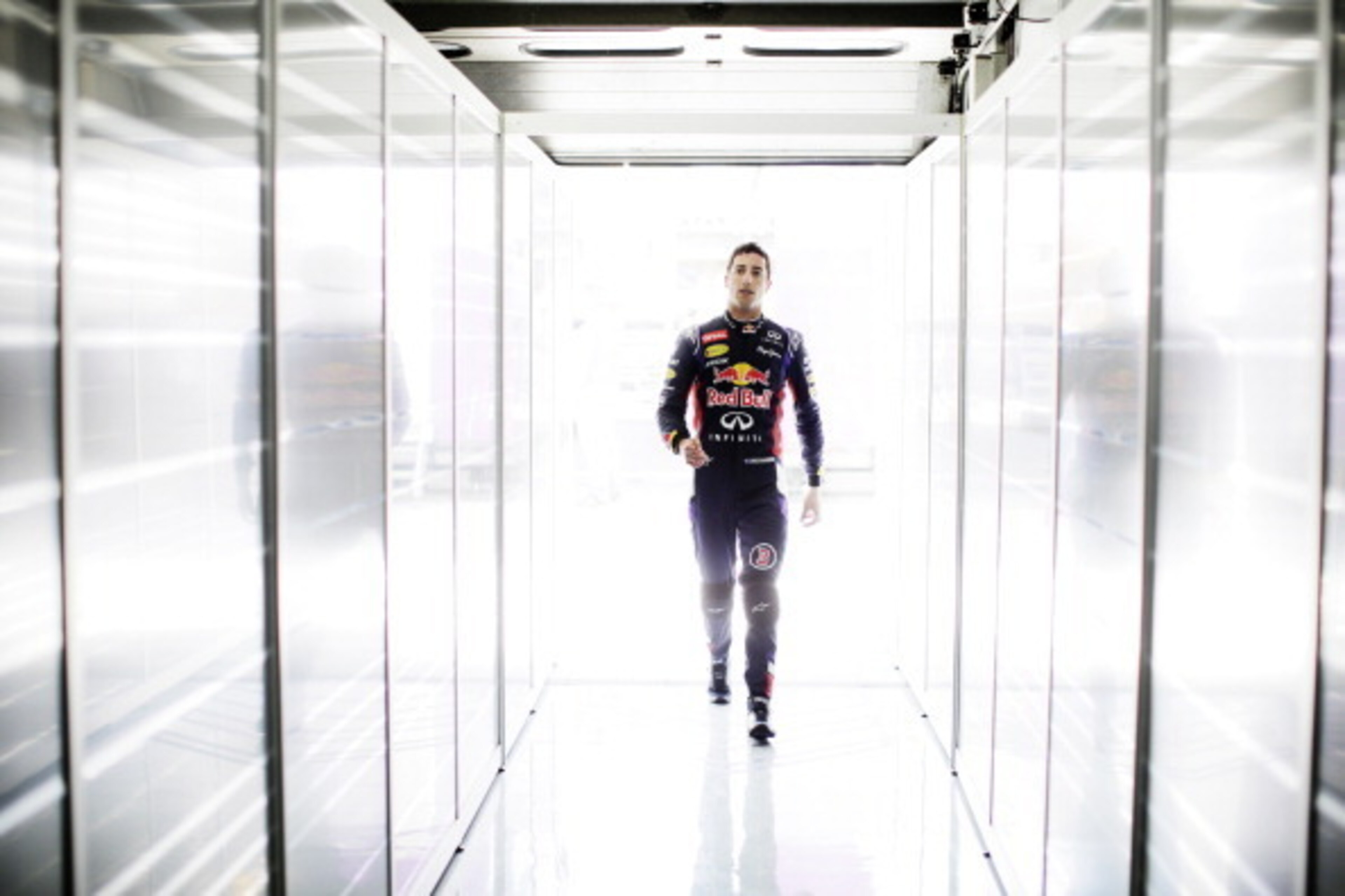 HOCKENHEIM, GERMANY - JULY 18:  Daniel Ricciardo of Australia and Infiniti Red Bull Racing walks into the garage during practice ahead of the German Grand Prix at Hockenheimring on July 18, 2014 in Hockenheim, Germany.  (Photo by Adam Pretty/Getty Images)