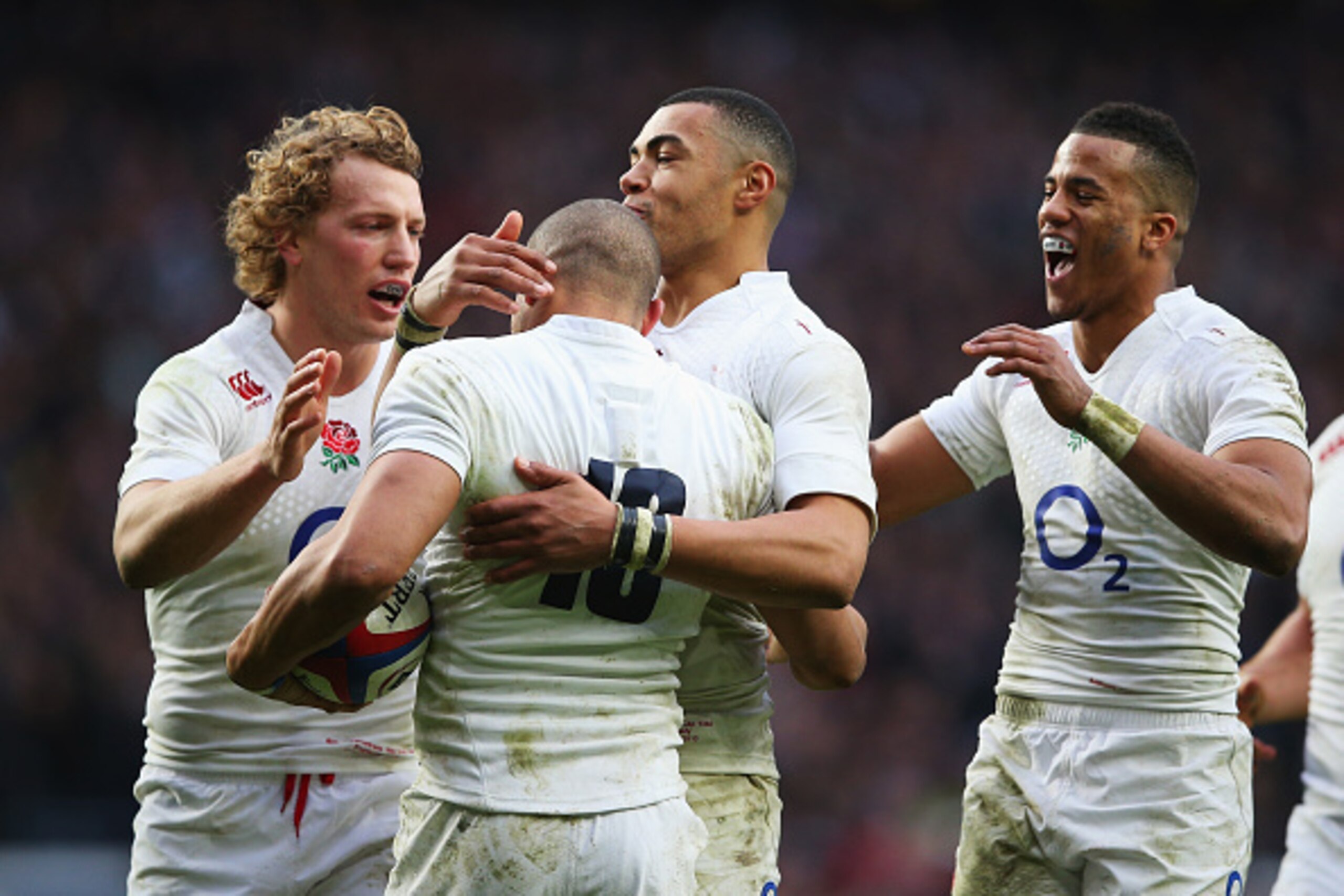 LONDON, ENGLAND - FEBRUARY 14: Jonathan Joseph (2ndL) of England celebrates scoring his second try with team mates Billy Twelvetrees, Luther Burrell and Anthony Watson of England during the RBS Six Nations match between England and Italy at Twickenham St LONDON, ENGLAND - FEBRUARY 14: Jonathan Joseph (2ndL) of England celebrates scoring his second try with team mates Billy Twelvetrees, Luther Burrell and Anthony Watson of England during the RBS Six Nations match between England and Italy at Twickenham St