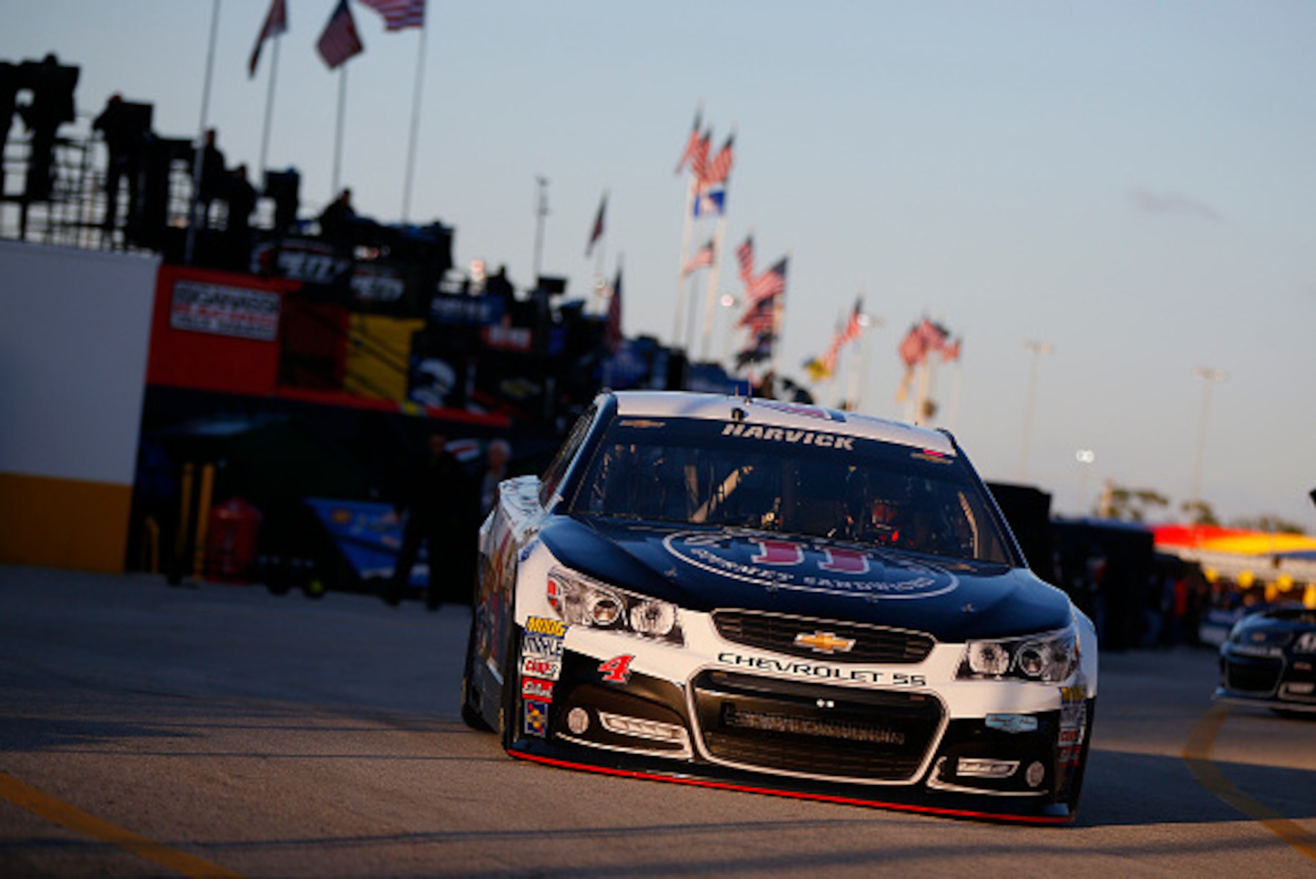 DAYTONA BEACH, FL - FEBRUARY 13: Kevin Harvick, driver of the #4 Jimmy John's/Budweiser Chevrolet, drives through the garage area practice for the NASCAR Sprint Cup Series 3rd Annual Sprint Unlimited at Daytona International Speedway on February 13, 2015 