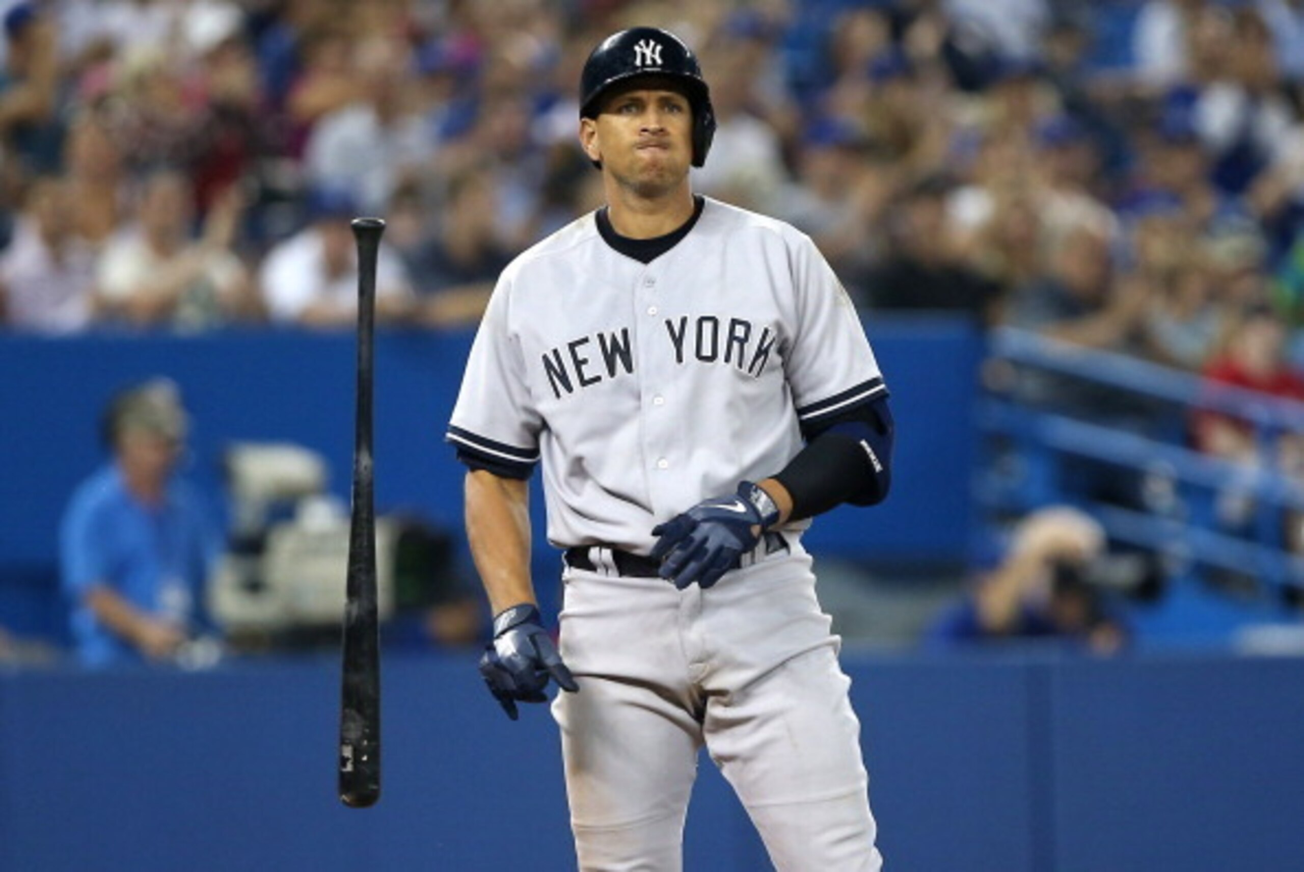 TORONTO, CANADA - AUGUST 26: Alex Rodriguez #13 of the New York Yankees reacts after striking out in the eighth inning during MLB game action against the Toronto Blue Jays on August 26, 2013 at Rogers Centre in Toronto, Ontario, Canada. (Photo by Tom Szcz