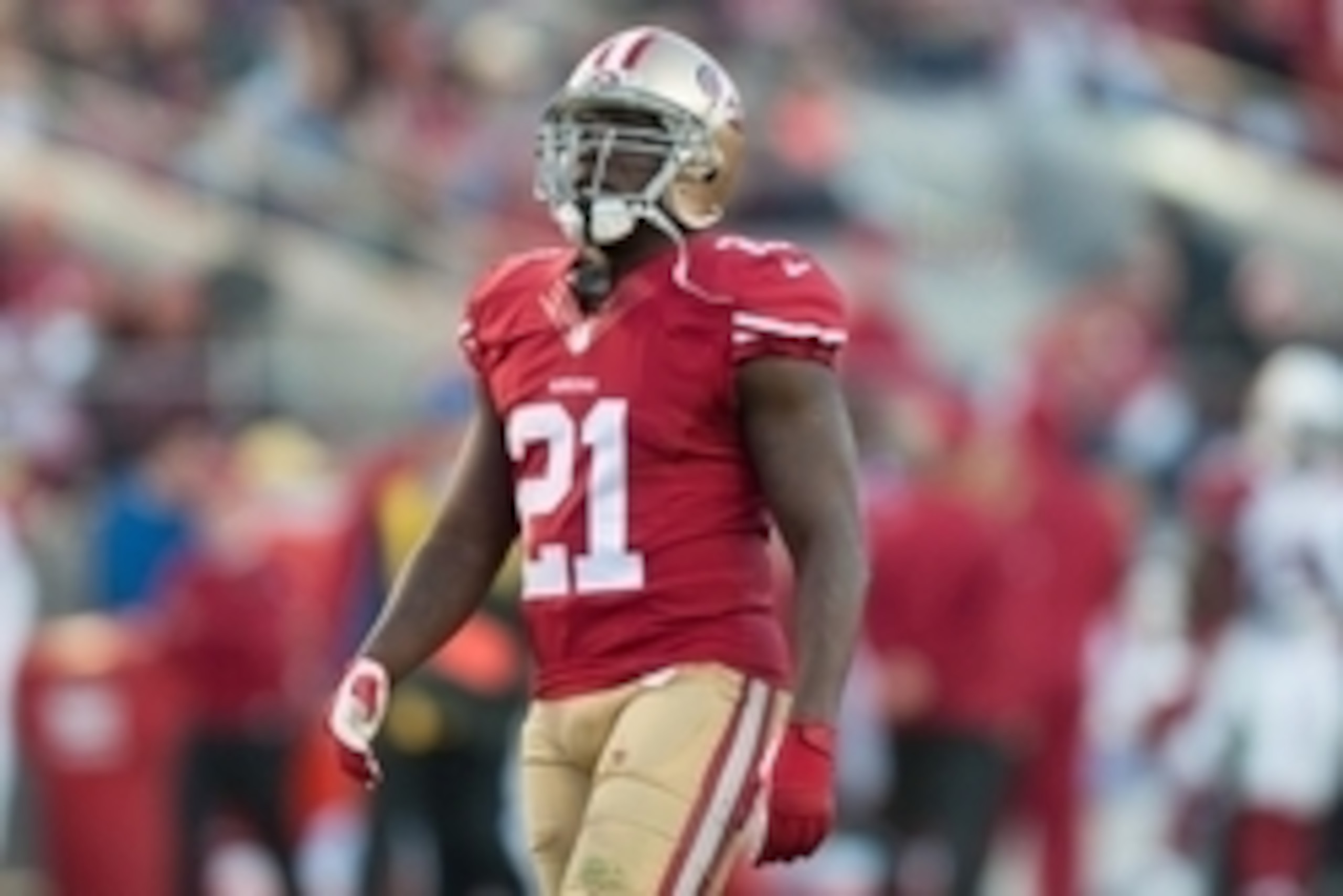 Dec 28, 2014; Santa Clara, CA, USA; San Francisco 49ers running back Frank Gore (21) looks on during the fourth quarter of the game against the Arizona Cardinals at Levi's Stadium. Mandatory Credit: Ed Szczepanski-USA TODAY Sports