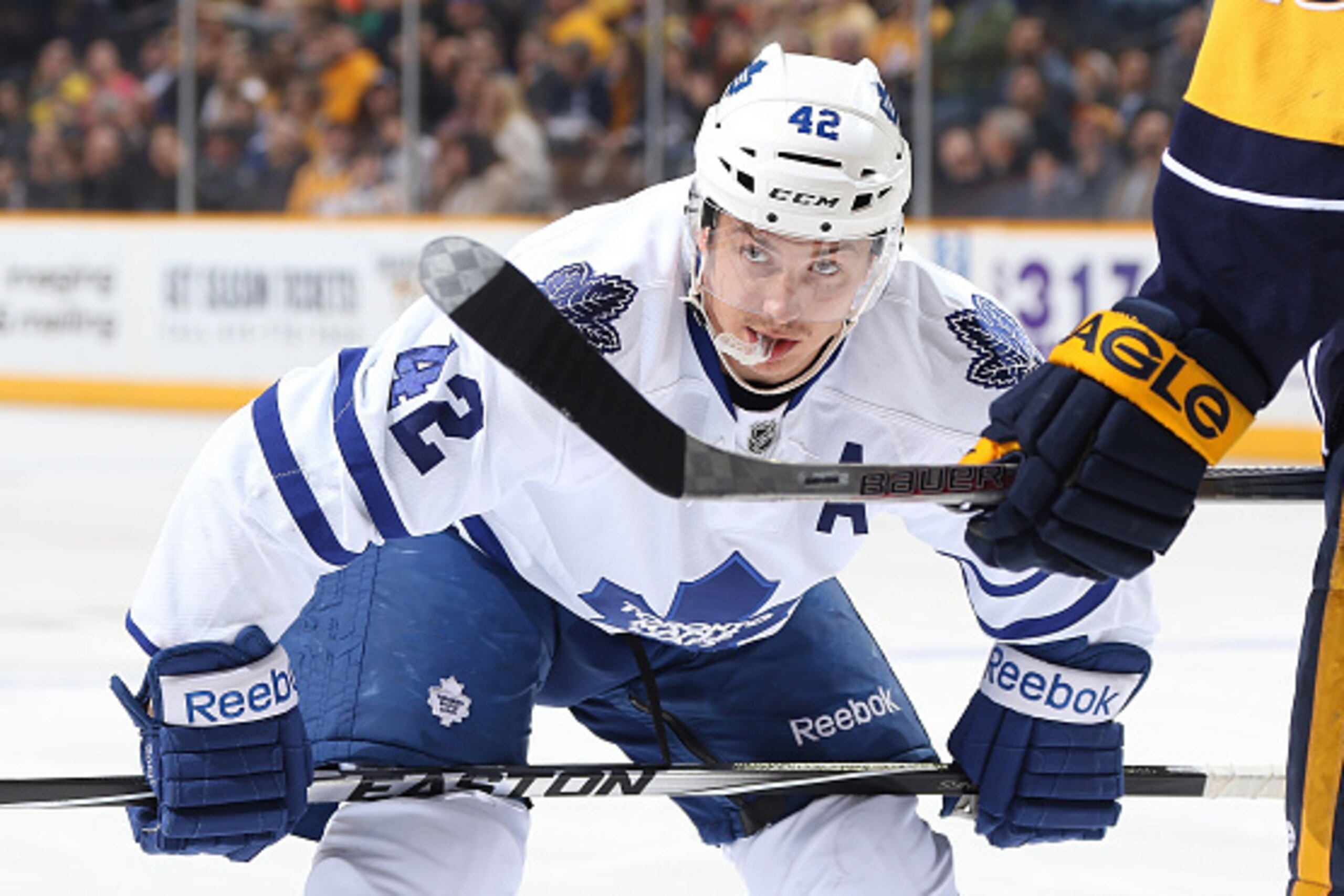 NASHVILLE, TN - FEBRUARY 3: Tyler Bozak #42 of the Toronto Maple Leafs gets ready for a face-off against the Nashville Predators during an NHL game at Bridgestone Arena on February 3, 2015 in Nashville, Tennessee. (Photo by John Russell/NHLI via Getty Ima NASHVILLE, TN - FEBRUARY 3: Tyler Bozak #42 of the Toronto Maple Leafs gets ready for a face-off against the Nashville Predators during an NHL game at Bridgestone Arena on February 3, 2015 in Nashville, Tennessee. (Photo by John Russell/NHLI via Getty Ima