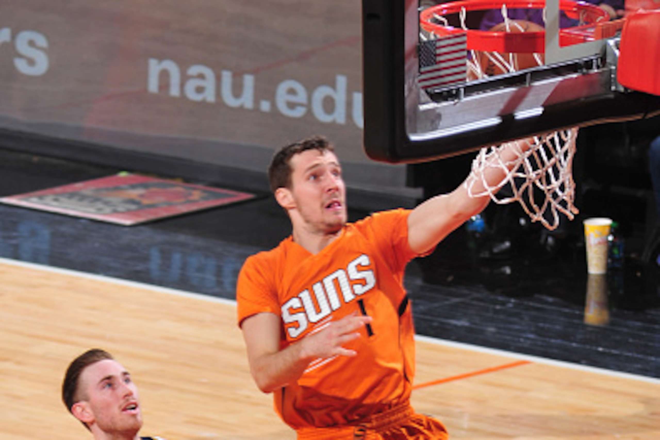 PHOENIX, AZ - FEBRUARY 6: Goran Dragic #1 of the Phoenix Suns goes up for a shot against the Utah Jazz on February 6, 2015 at U.S. Airways Center in Phoenix, Arizona. NOTE TO USER: User expressly acknowledges and agrees that, by downloading and or using t