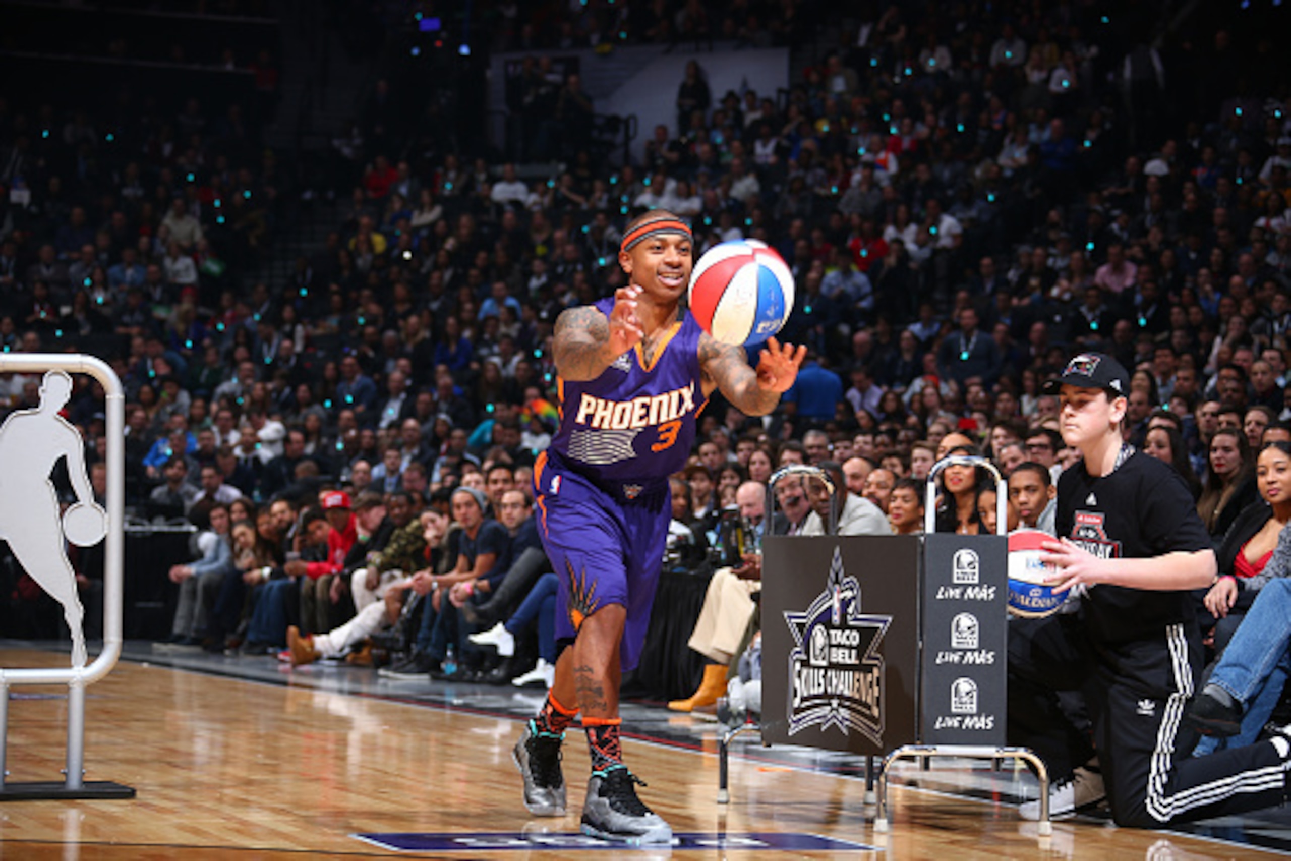 BROOKLYN, NY - FEBRUARY 14:  Former NBA player Isaiah Thomas #3 from the Phoenix Suns during the Taco Bell Skills Challenge on State Farm All-Star Saturday Night as part of the 2015 NBA All-Star Weekend on February 14, 2015 at Barclays Center in Brooklyn,