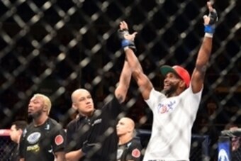 Oct 25, 2014; Rio de Janeiro, Brazil; Neil Magny (blue gloves) reacts after his fight against William Macario (not pictured) during UFC 179 at Ginasio do Maracanazinho. Mandatory Credit: Jason Silva-USA TODAY Sports