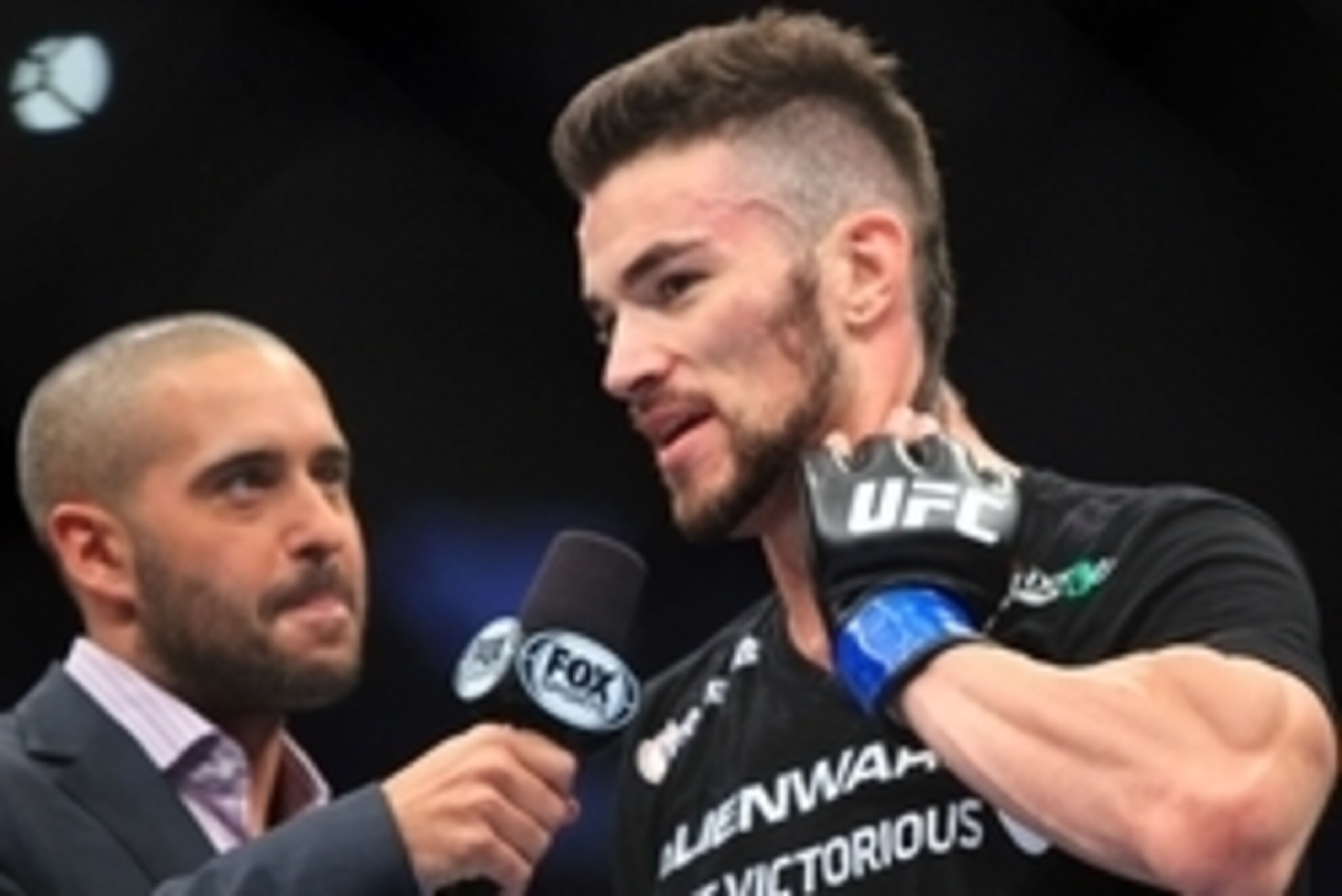 Aug 27, 2013; Indianapolis, IN, USA; Brandon Thatch is interviewed after beating Justin Edwards during UFC Fight Night 27 at Bankers Life Fieldhouse. Mandatory Credit: Pat Lovell-USA TODAY Sports