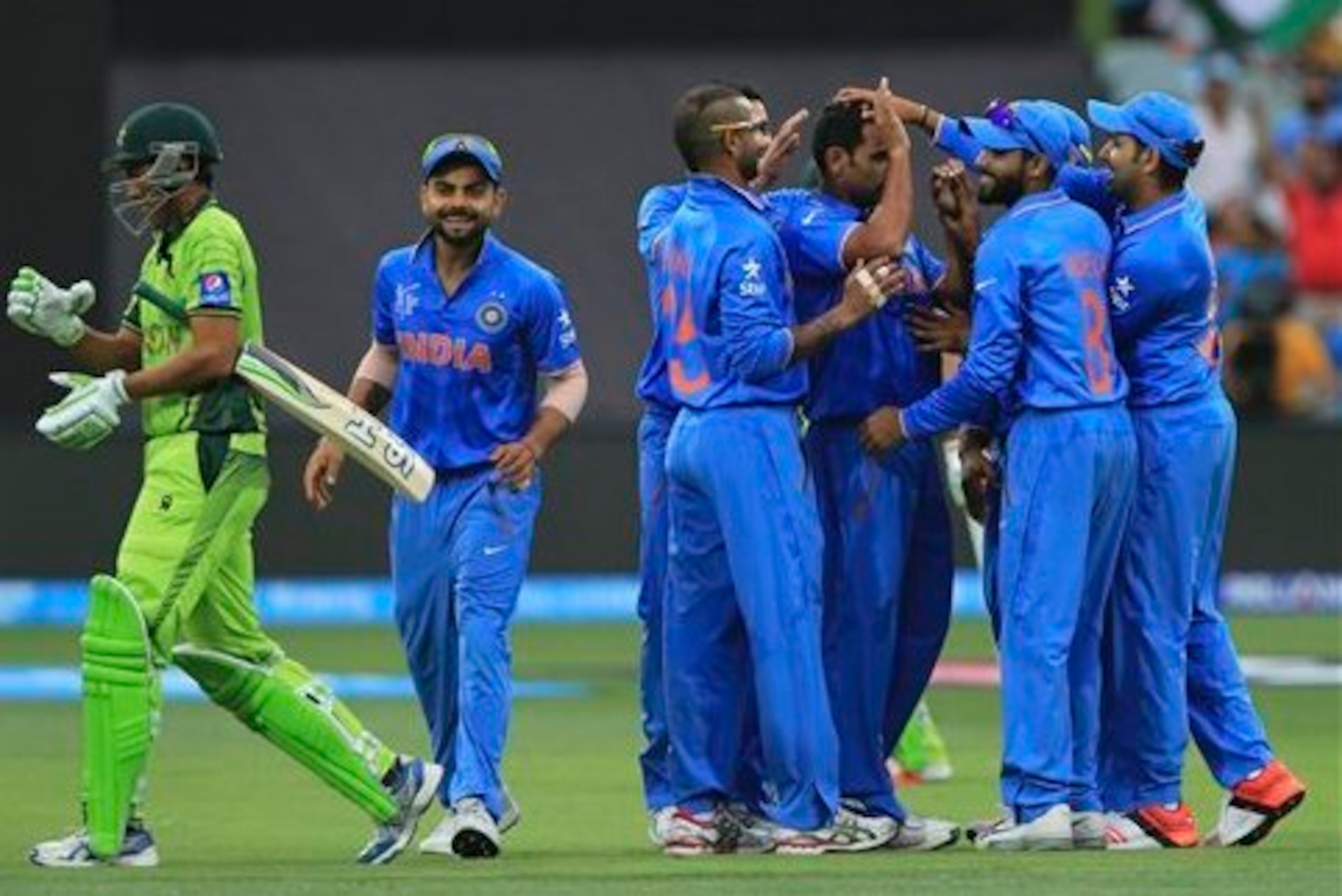 India celebrate the wicket of Younis Khan