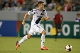 Aug 20, 2013; Carson, CA, USA; Los Angeles Galaxy forward Robbie Rogers (14) in a Champions League match against Cartagines at the StubHub Center. The Galaxy defeated Cartagines 2-0. Mandatory Credit: Kirby Lee-USA TODAY Sports