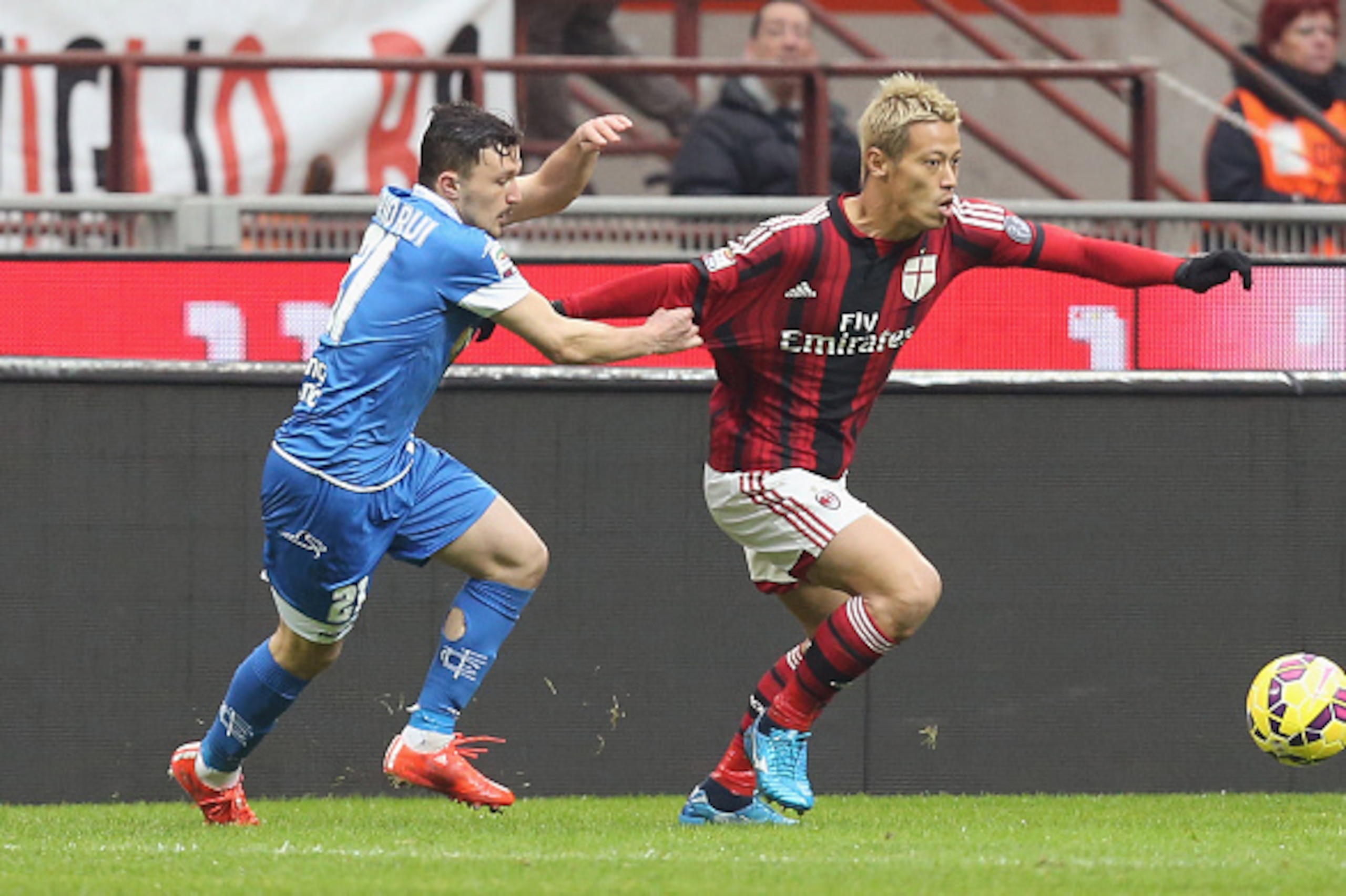 MILAN, ITALY - FEBRUARY 15: Keisuke Honda (R) of Milan competes for the ball with Mario Rui of Empoli during the Serie A match between AC Milan and Empoli FC at Stadio Giuseppe Meazza on February 15, 2015 in Milan, Italy. (Photo by Maurizio Lagana/Getty MILAN, ITALY - FEBRUARY 15: Keisuke Honda (R) of Milan competes for the ball with Mario Rui of Empoli during the Serie A match between AC Milan and Empoli FC at Stadio Giuseppe Meazza on February 15, 2015 in Milan, Italy. (Photo by Maurizio Lagana/Getty