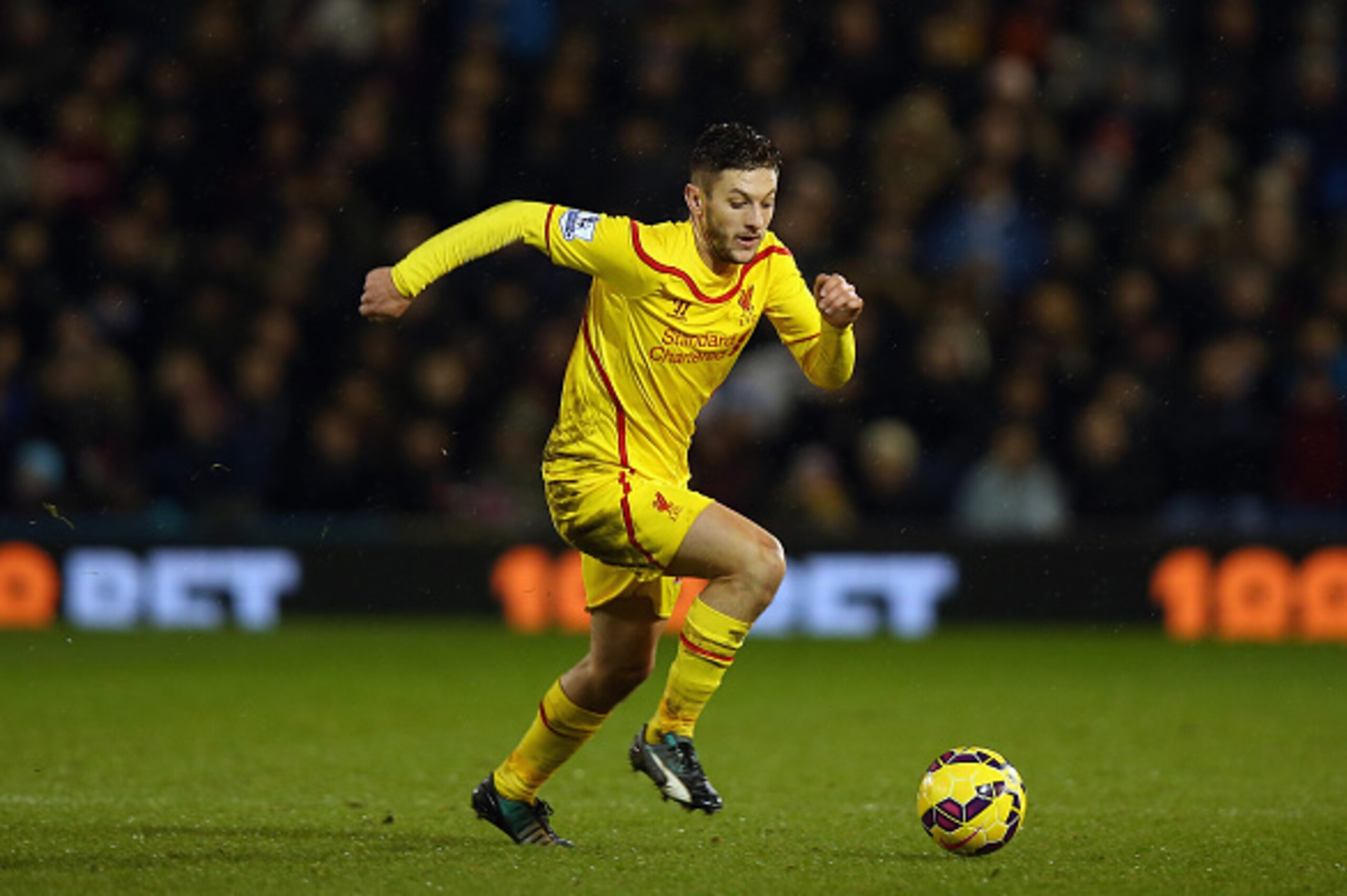BURNLEY, ENGLAND - DECEMBER 26:  Adam Lallana of Liverpool in action during the Barclays Premier League match between Burnley and Liverpool at Turf Moor on December 26, 2014 in Burnley, England.  (Photo by Bryn Lennon/Getty Images)