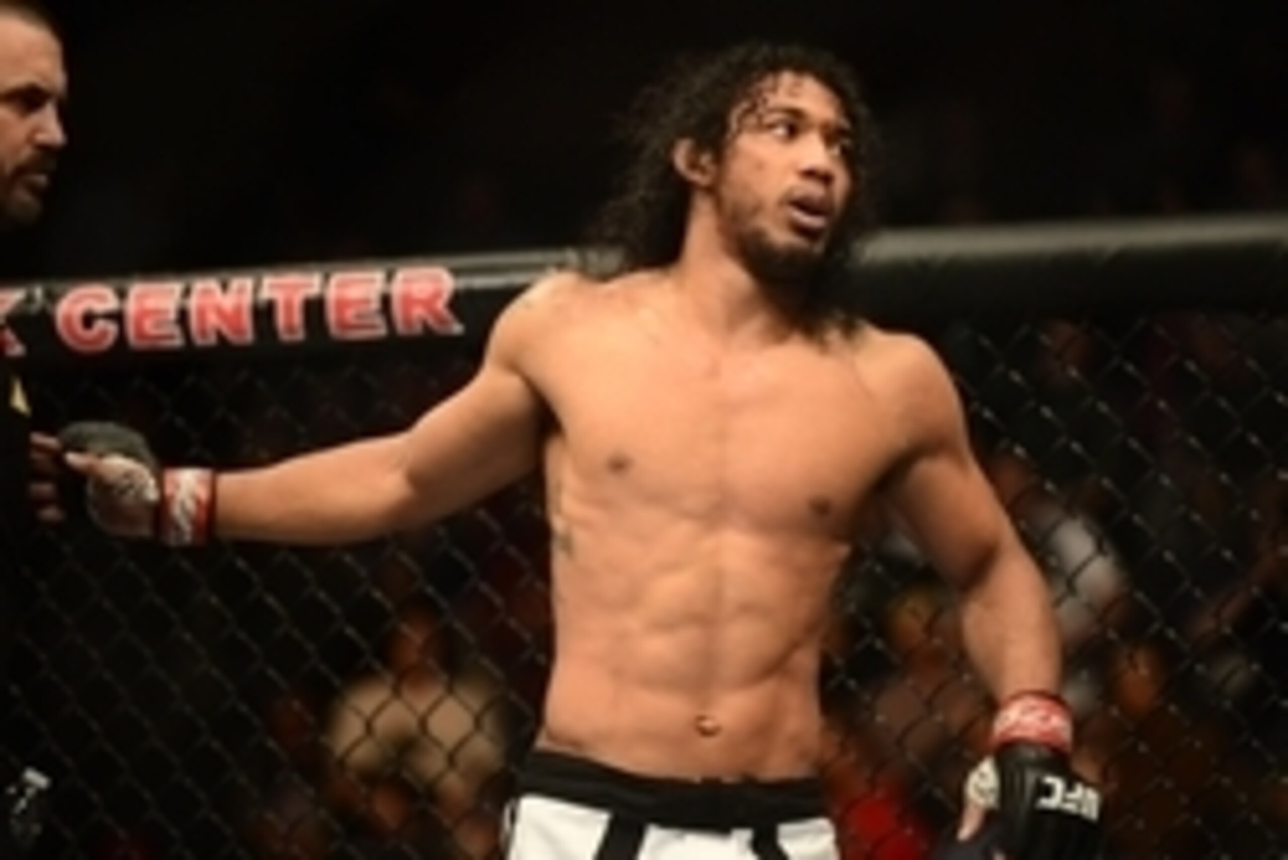 Feb 14, 2015; Broomfield, CO, USA; Benson Henderson (red) celebrates his win over Brandon Thatch (not pictured) following the welterweight bout at the UFC Fight Night at the 1stBANK Center. Mandatory Credit: Ron Chenoy-USA TODAY Sports