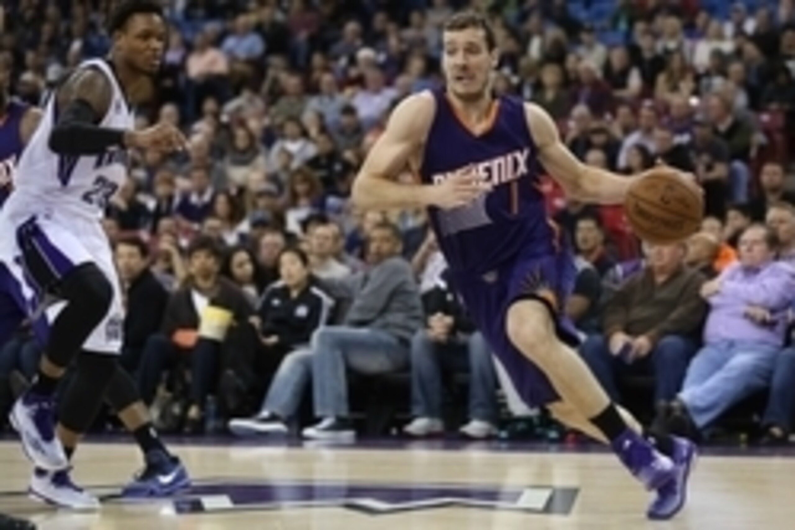 Feb 8, 2015; Sacramento, CA, USA; Phoenix Suns guard Goran Dragic (1) drives baseline against Sacramento Kings guard Ben McLemore (23) during the first quarter at Sleep Train Arena. Mandatory Credit: Kelley L Cox-USA TODAY Sports
