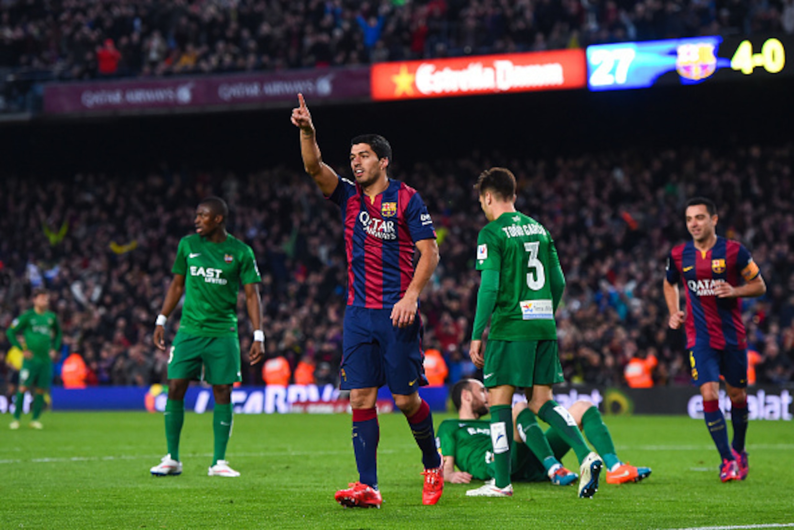 BARCELONA, SPAIN - FEBRUARY 15:  Luis Suarez of FC Barcelona celebrates after scoring his team's fifth goal during the La Liga match between FC Barcelona and Levante UD at Camp Nou on February 15, 2015 in Barcelona, Spain.  (Photo by David Ramos/Getty Ima