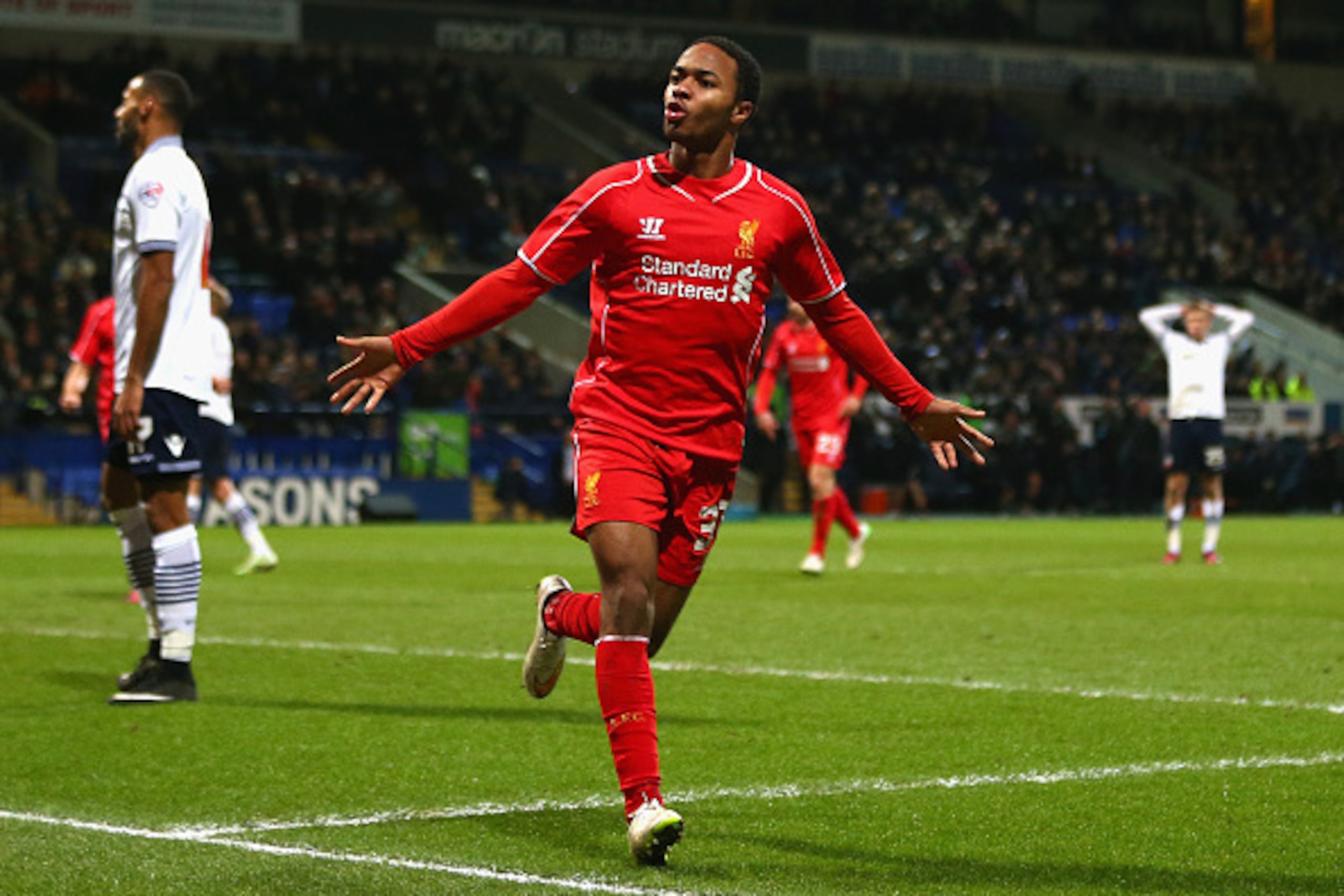 BOLTON, ENGLAND - FEBRUARY 04: Raheem Sterling of Liverpool celebrates scoring their first goal during the FA Cup Fourth round replay between Bolton Wanderers and Liverpool at Macron Stadium on February 4, 2015 in Bolton, England. (Photo by Michael Ste BOLTON, ENGLAND - FEBRUARY 04: Raheem Sterling of Liverpool celebrates scoring their first goal during the FA Cup Fourth round replay between Bolton Wanderers and Liverpool at Macron Stadium on February 4, 2015 in Bolton, England. (Photo by Michael Ste