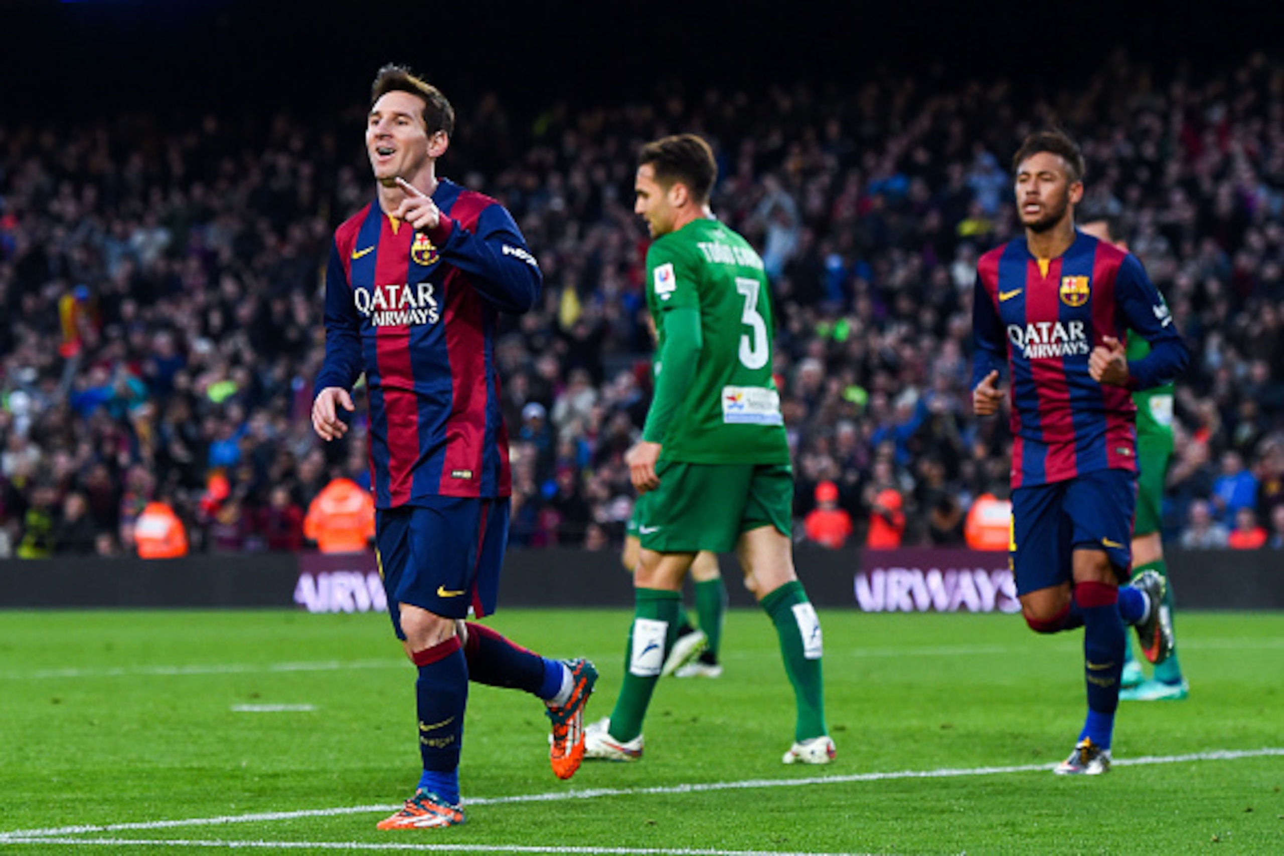 BARCELONA, SPAIN - FEBRUARY 15:  Lionel Messi of FC Barcelona celebrates after scoring his team's third goal during the La Liga match between FC Barcelona and Levante UD at Camp Nou on February 15, 2015 in Barcelona, Spain.  (Photo by David Ramos/Getty Im