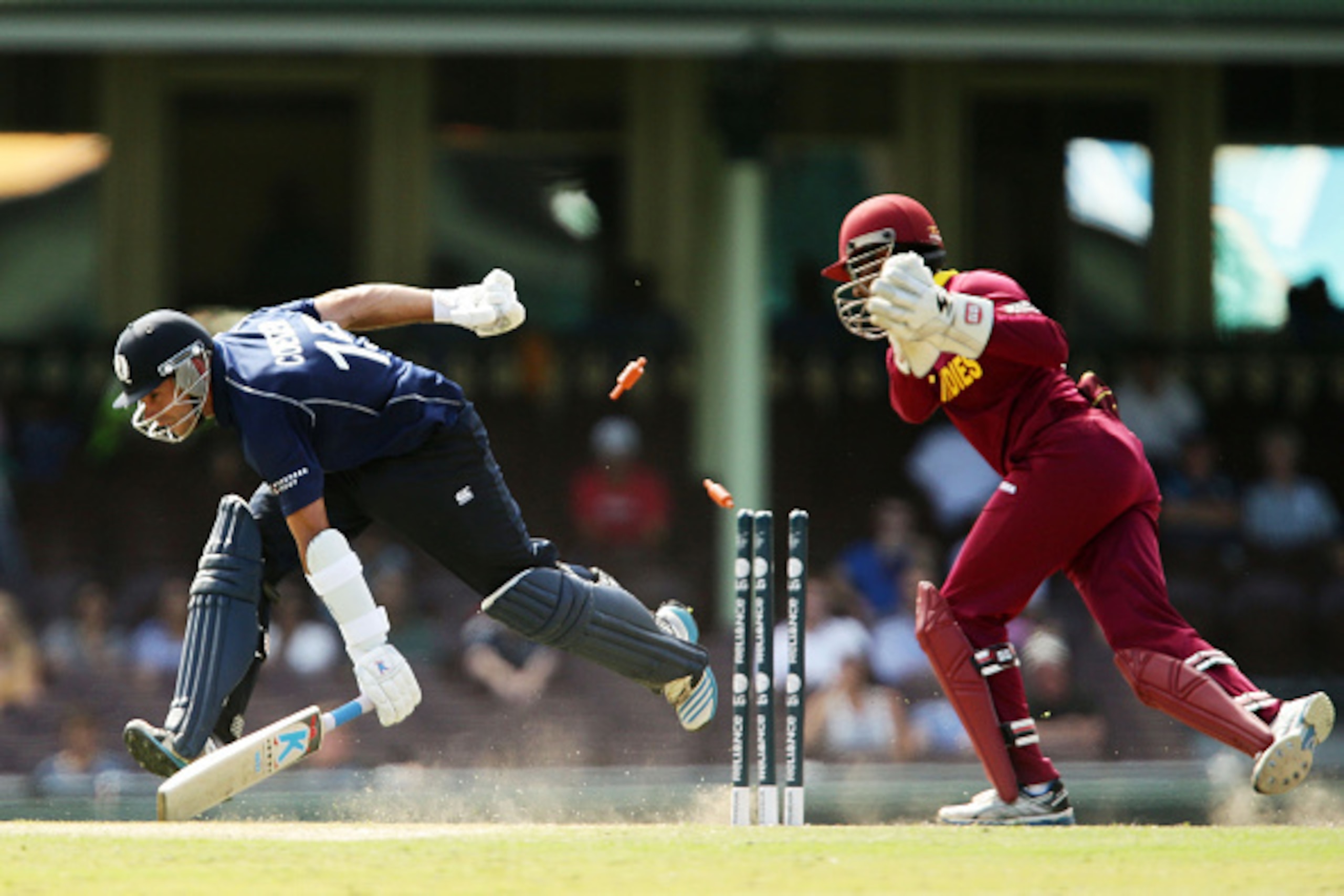 SYDNEY, AUSTRALIA - FEBRUARY 12:  Kyle Coetzer of Scotland slides in to avoid a runout during the ICC Cricket World Cup warm up match between the West Indies and Scotland at Sydney Cricket Ground on February 12, 2015 in Sydney, Australia.  (Photo by Matt 