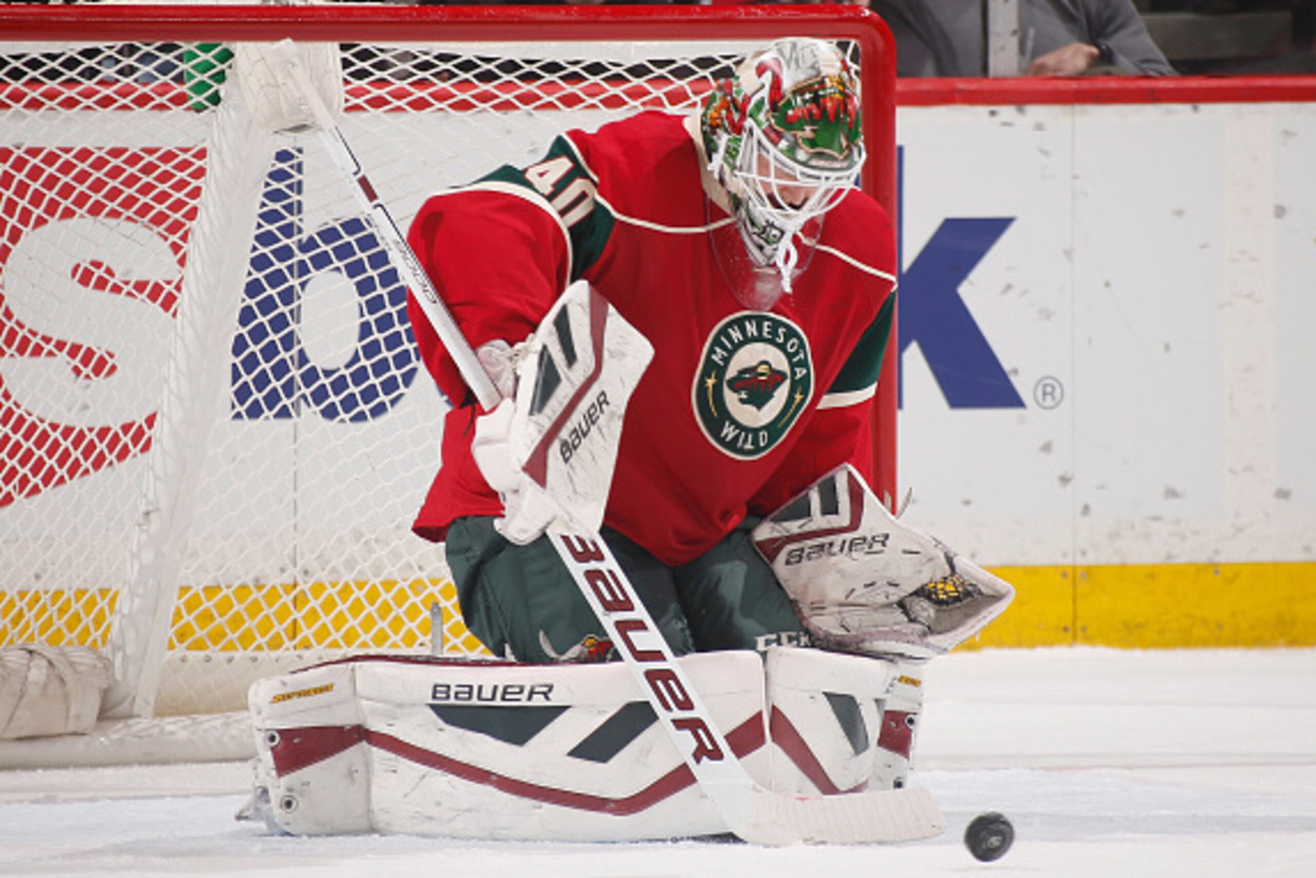 ST. PAUL, MN - FEBRUARY 9: Devan Dubnyk #40 of the Minnesota Wild makes a save against the Vancouver Canucks during the game on February 9, 2015 at the Xcel Energy Center in St. Paul, Minnesota. (Photo by Bruce Kluckhohn/NHLI via Getty Images)