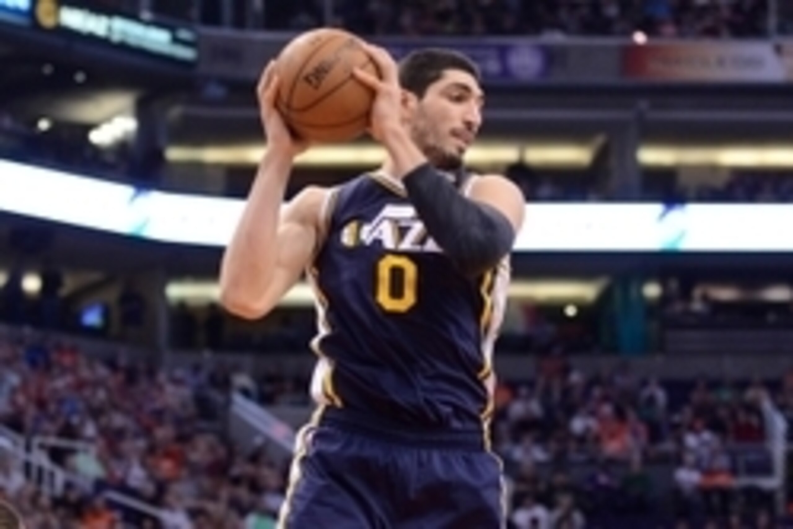 Feb 6, 2015; Phoenix, AZ, USA; Utah Jazz center Enes Kanter (0) grabs a rebound against the Phoenix Suns at US Airways Center. Mandatory Credit: Joe Camporeale-USA TODAY Sports