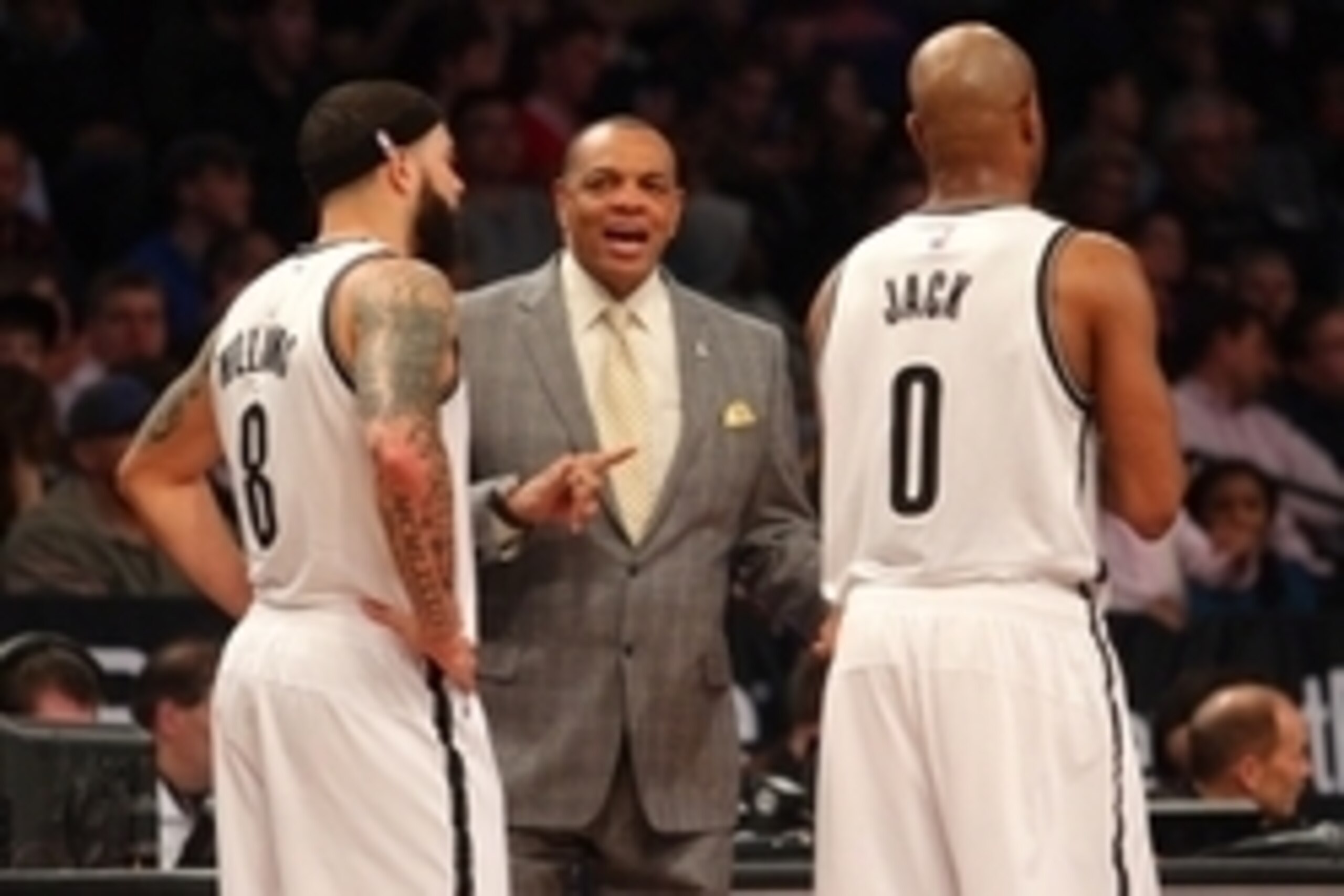 Feb 2, 2015; Brooklyn, NY, USA; Brooklyn Nets head coach Lionel Hollins talks with Brooklyn Nets point guard Deron Williams (8) and Brooklyn Nets point guard Jarrett Jack (0) during the third quarter against the Los Angeles Clippers at Barclays Center. Th
