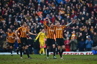 BRADFORD, ENGLAND - FEBRUARY 15:  Jon Stead of Bradford celebrates with team-mates after scoring their second goal during the FA Cup Fifth Round match between Bradford City and Sunderland at Coral Windows Stadium, Valley Parade on February 15, 2015 in Bra