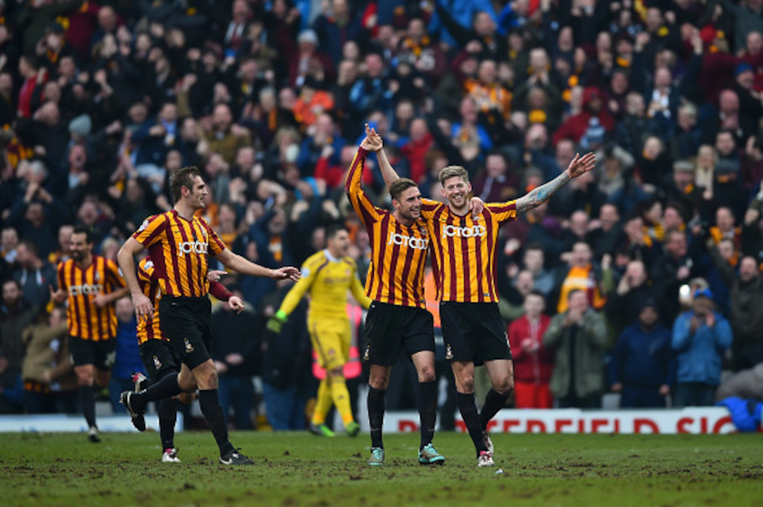 BRADFORD, ENGLAND - FEBRUARY 15:  Jon Stead of Bradford celebrates with team-mates after scoring their second goal during the FA Cup Fifth Round match between Bradford City and Sunderland at Coral Windows Stadium, Valley Parade on February 15, 2015 in Bra