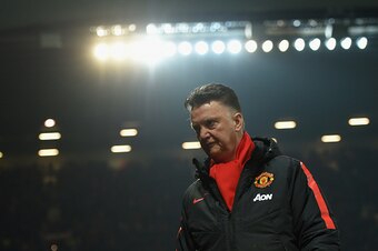 MANCHESTER, ENGLAND - FEBRUARY 11:  Louis van Gaal, manager of Manchester United takes his seat during the Barclays Premier League match between Manchester United and Burnley at Old Trafford on February 11, 2015 in Manchester, England.  (Photo by Michael 