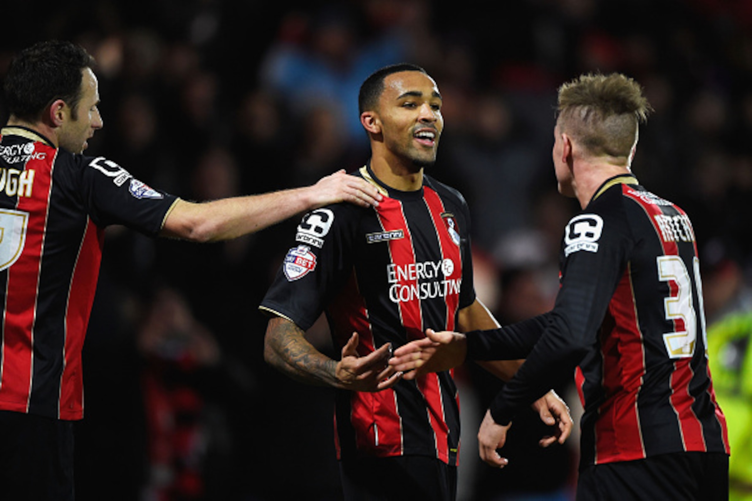 BOURNEMOUTH, ENGLAND - FEBRUARY 10: Callum Wilson of Bournemouth (C) celebrates with Matt Ritchie (R) and Marc Pugh (L) as he scores their second goal during the Sky Bet Championship match between AFC Bournemouth and Derby County at Goldsands Stadium on BOURNEMOUTH, ENGLAND - FEBRUARY 10: Callum Wilson of Bournemouth (C) celebrates with Matt Ritchie (R) and Marc Pugh (L) as he scores their second goal during the Sky Bet Championship match between AFC Bournemouth and Derby County at Goldsands Stadium on