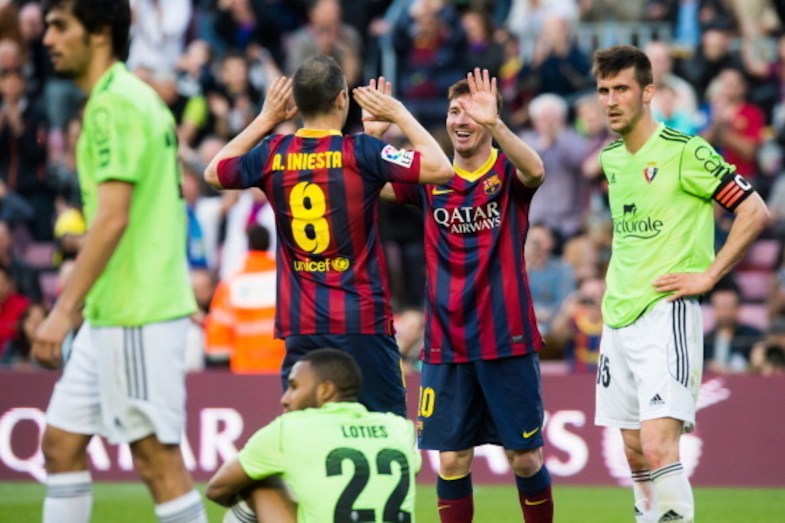 BARCELONA, SPAIN - MARCH 16: Lionel Messi of FC Barcelona is congratulated by his teammate Andres Iniesta after scoring his team's fourth goal and his goal number 370 for the FC Barcelona becoming the maximum scorer on the history of FC Barcelona during t BARCELONA, SPAIN - MARCH 16: Lionel Messi of FC Barcelona is congratulated by his teammate Andres Iniesta after scoring his team's fourth goal and his goal number 370 for the FC Barcelona becoming the maximum scorer on the history of FC Barcelona during t