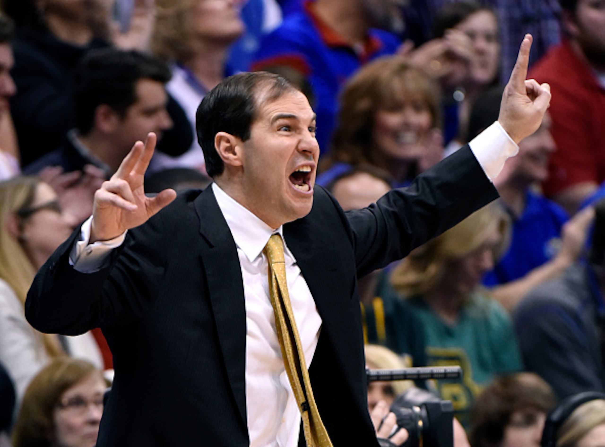 LAWRENCE, KS - FEBRUARY 14:  Head coach Scott Drew of the Baylor Bears calls out signals to his players during a game against the Kansas Jayhawks in the second half at Allen Fieldhouse on February 14, 2015 in Lawrence, Kansas. Kansas won 74-64. (Photo by 
