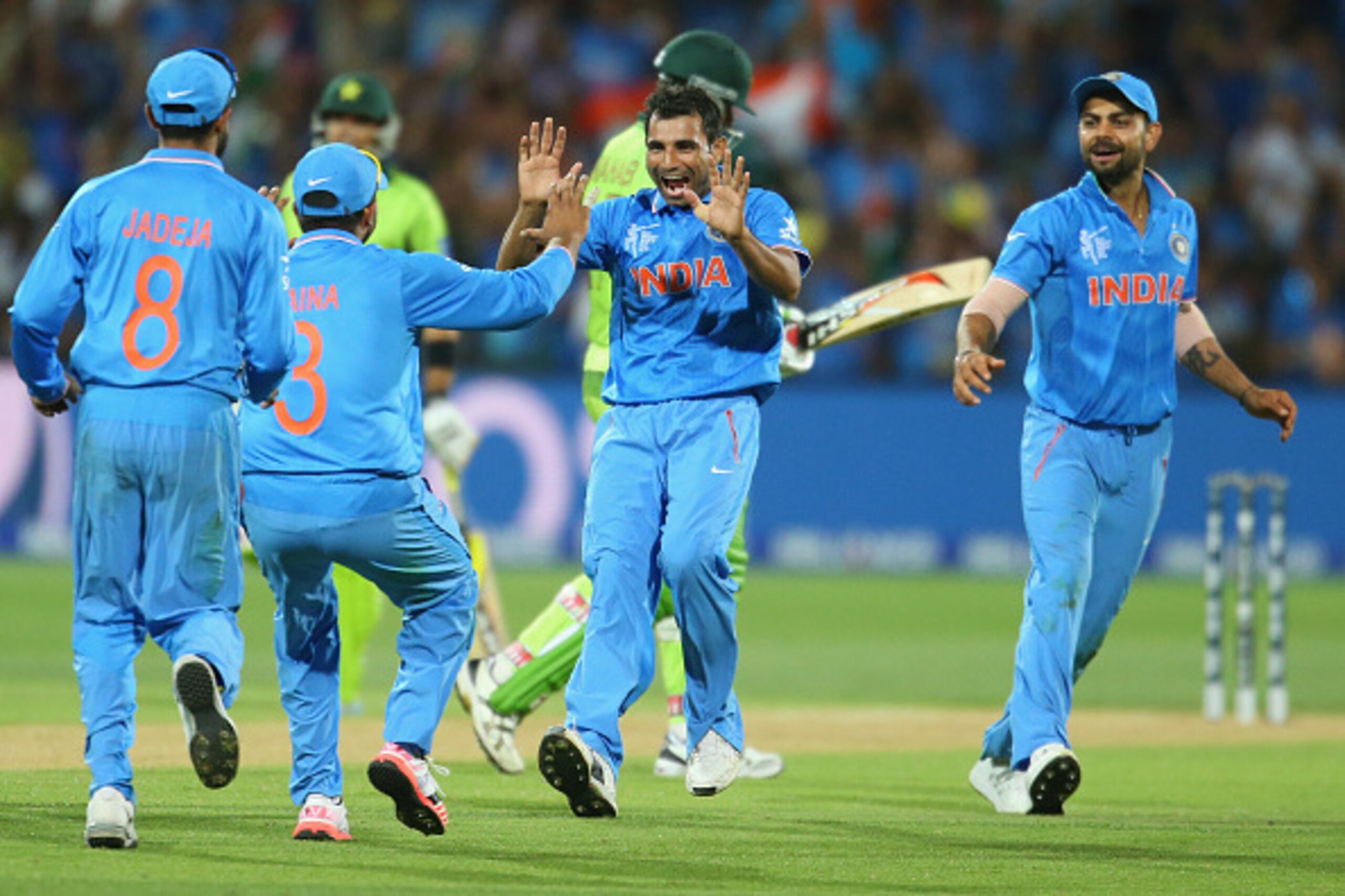 ADELAIDE, AUSTRALIA - FEBRUARY 15:  Mohammed Shami of India celebrates with his teammates after dismissing Wahab Riaz of Pakistan during the 2015 ICC Cricket World Cup match between India and Pakistan at Adelaide Oval on February 15, 2015 in Adelaide, Aus