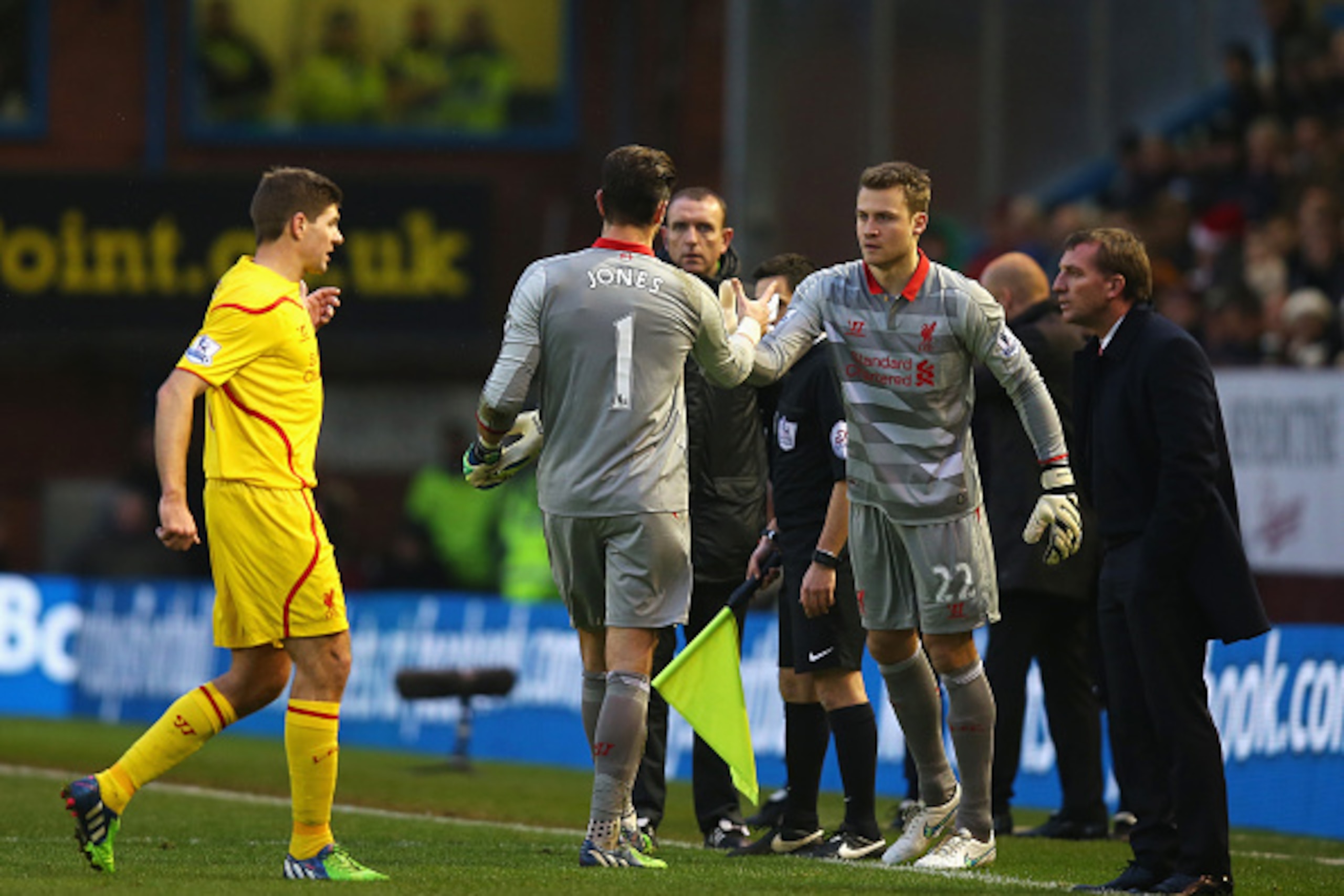 BURNLEY, ENGLAND - DECEMBER 26: Goalkeeper Brad Jones of Liverpool is replaced by Simon Mignolet of Liverpool as Steven Gerrard talks to Brendan Rodgers, manager of Liverpool during the Barclays Premier League match between Burnley and Liverpool at Turf M