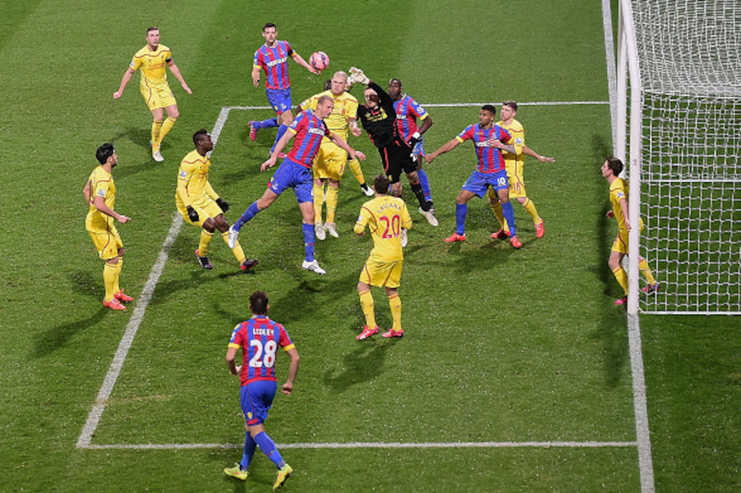 LONDON, ENGLAND - FEBRUARY 14:  Simon Mignolet of Liverpool looks to clear the ball during the FA Cup fifth round match between Crystal Palace and Liverpool at Selhurst Park on February 14, 2015 in London, England.  (Photo by Jamie McDonald/Getty Images)