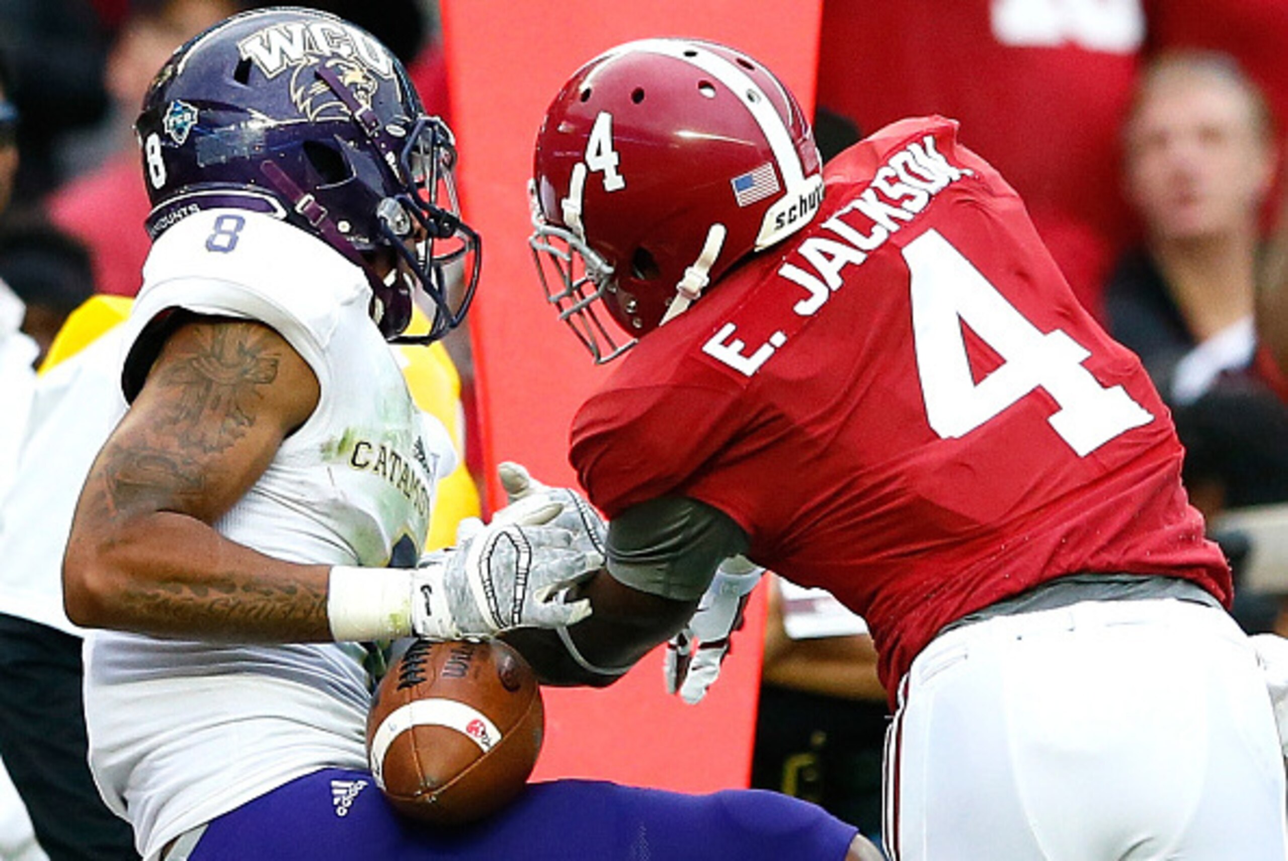 TUSCALOOSA, AL - NOVEMBER 22:  Spearman Robinson #8 of the Western Carolina Catamounts pulls in this reception for a touchdown against Eddie Jackson #4 of the Alabama Crimson Tide at Bryant-Denny Stadium on November 22, 2014 in Tuscaloosa, Alabama.  (Phot