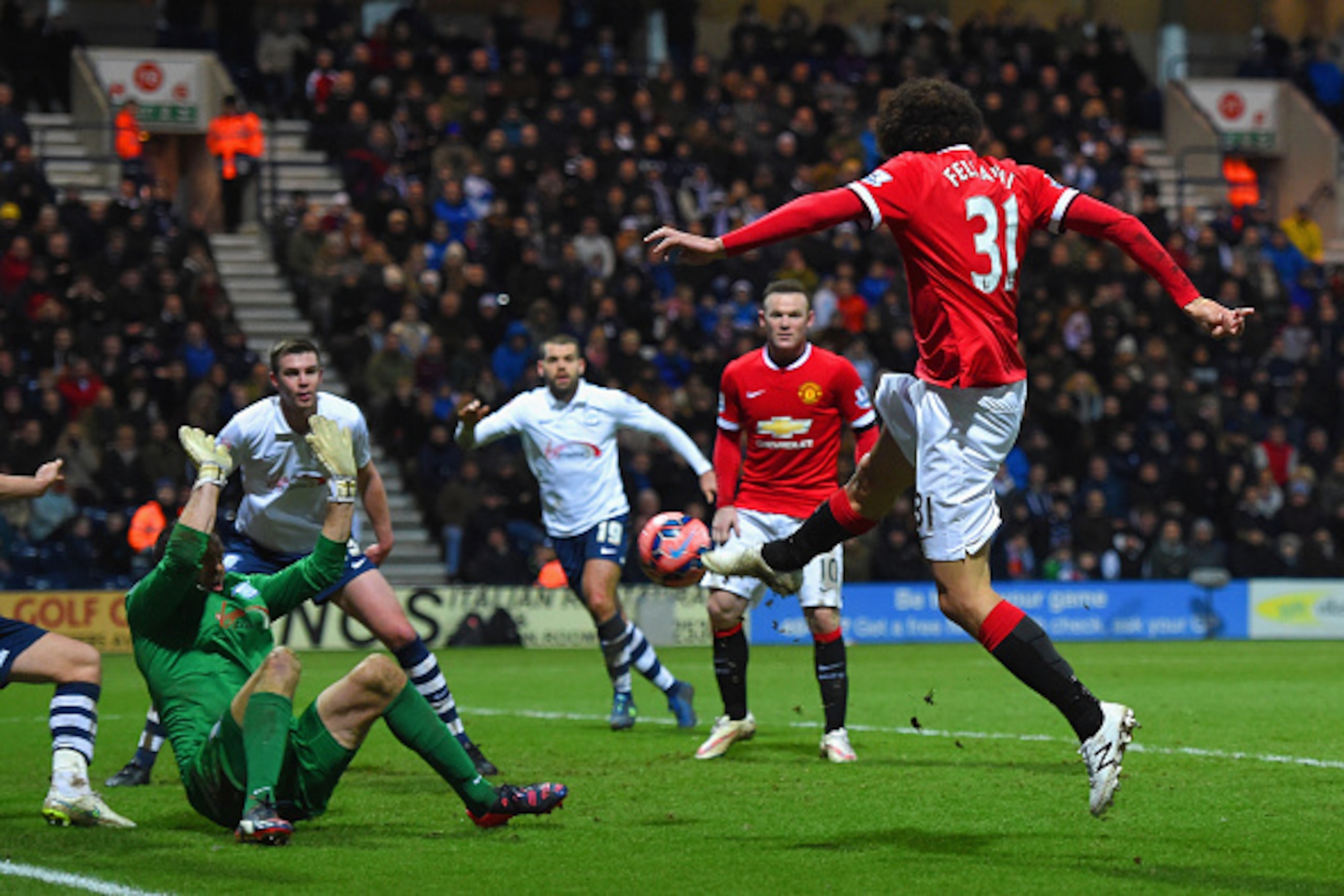 PRESTON, ENGLAND - FEBRUARY 16:  Marouane Fellaini of Manchester United scores their second goal past Thorsten Stuckmann of Preston North End during the FA Cup Fifth round match between Preston North End and Manchester United at Deepdale on February 16, 2