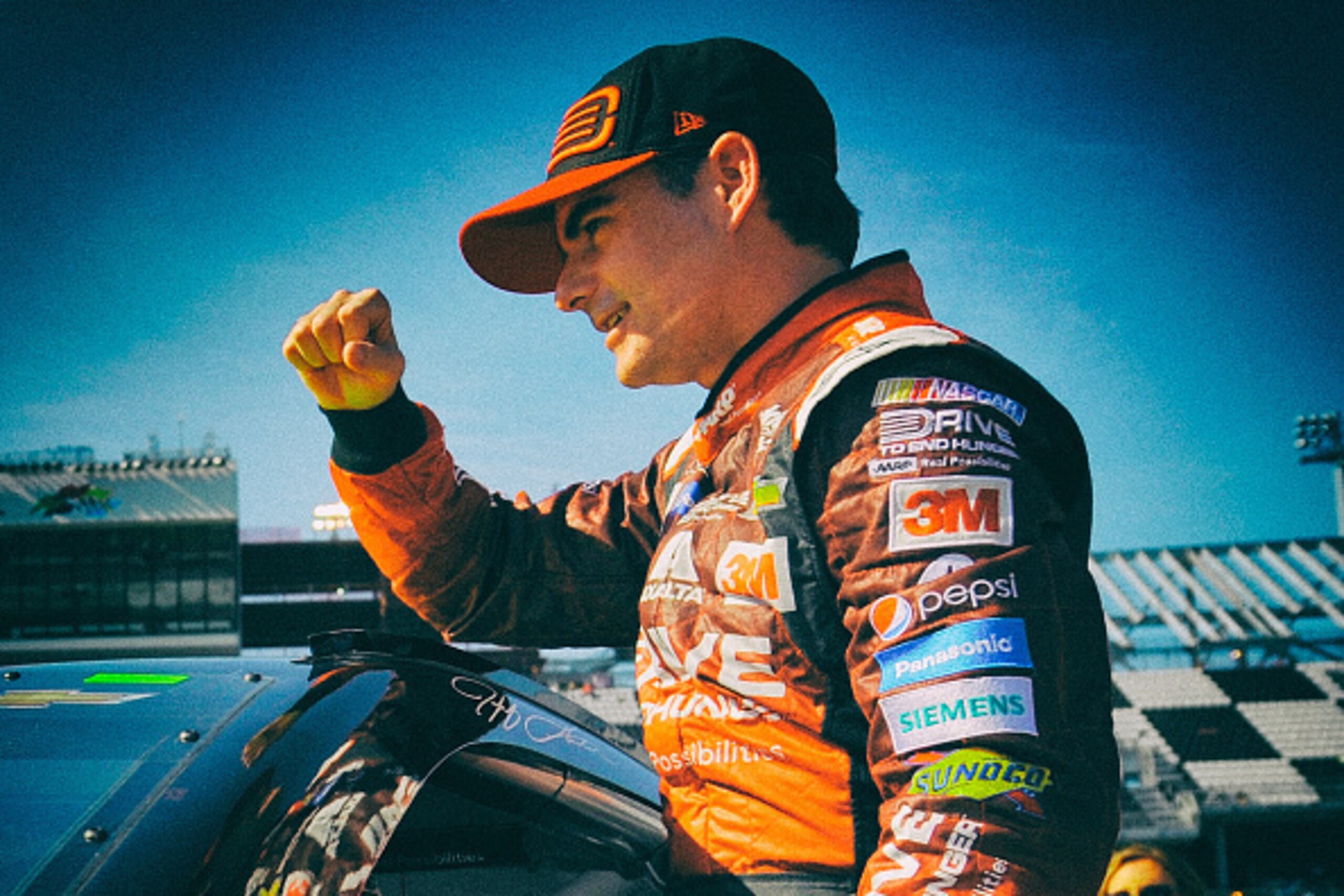 DAYTONA BEACH, FL - FEBRUARY 15:  (EDITOR'S NOTE: Image was processed using digital filters.) Jeff Gordon, driver of the #24 Drive To End Hunger Chevrolet, celebrates after qualifying for pole position for the 57th Annual Daytona 500 at Daytona Internatio