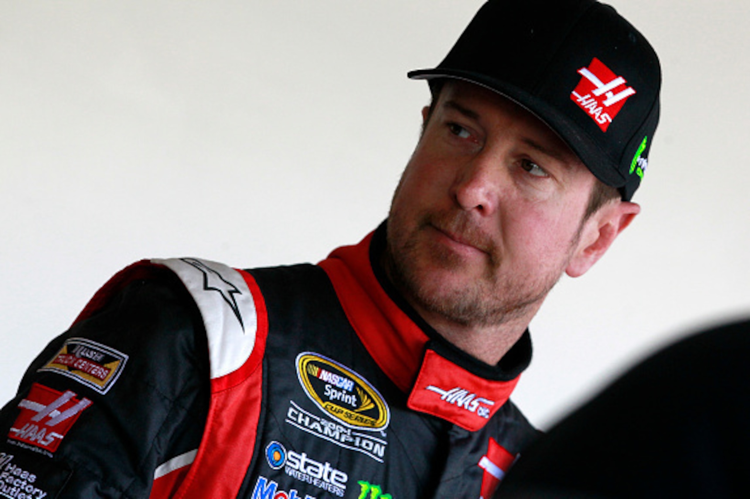 DAYTONA BEACH, FL - FEBRUARY 14:  Kurt Busch, driver of the #41 Haas Automation Chevrolet, stands in the garage area during practice for the 57th Annual Daytona 500 at Daytona International Speedway on February 14, 2015 in Daytona Beach, Florida.  (Photo 