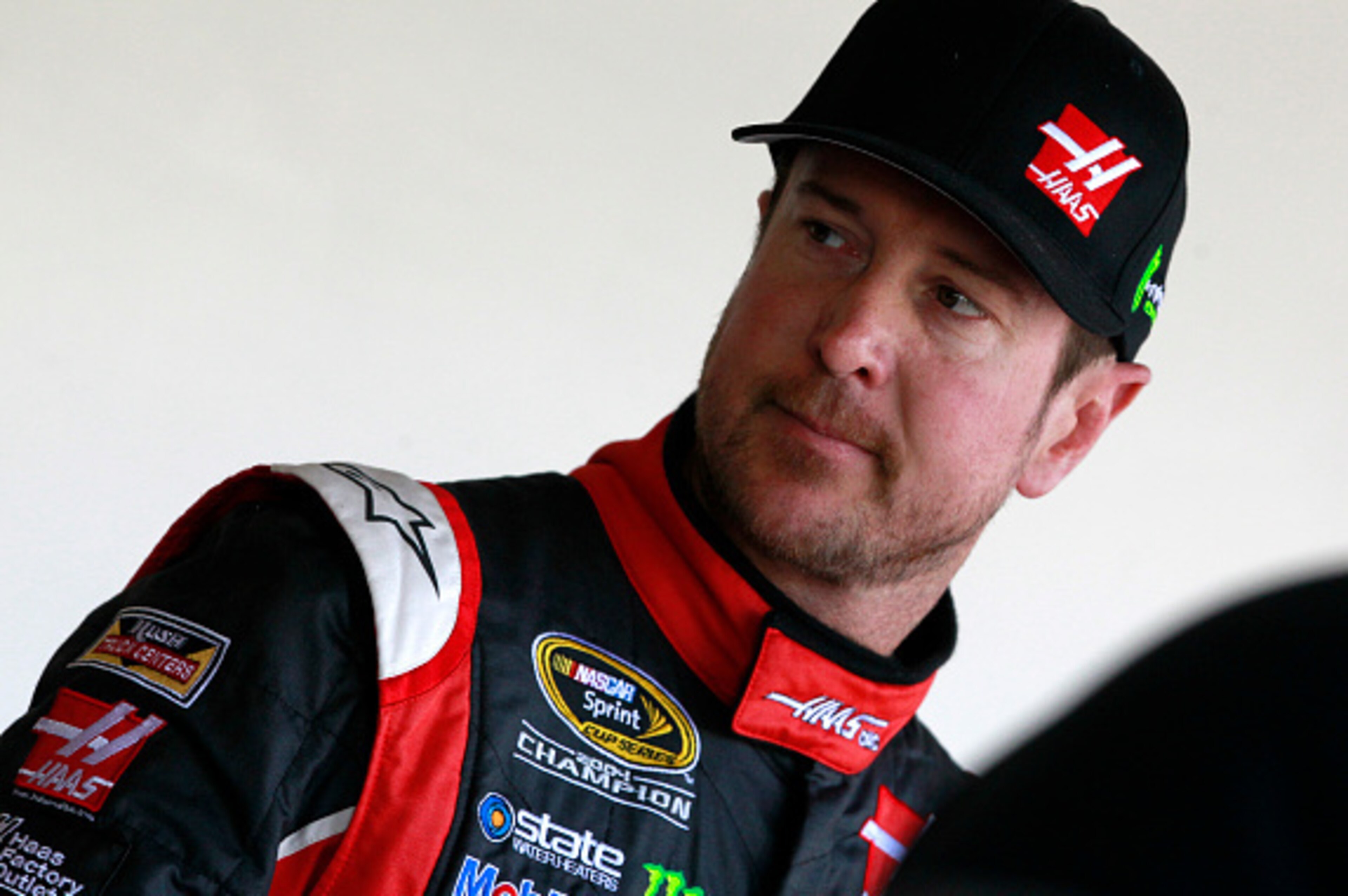 DAYTONA BEACH, FL - FEBRUARY 14:  Kurt Busch, driver of the #41 Haas Automation Chevrolet, stands in the garage area during practice for the 57th Annual Daytona 500 at Daytona International Speedway on February 14, 2015 in Daytona Beach, Florida.  (Photo 